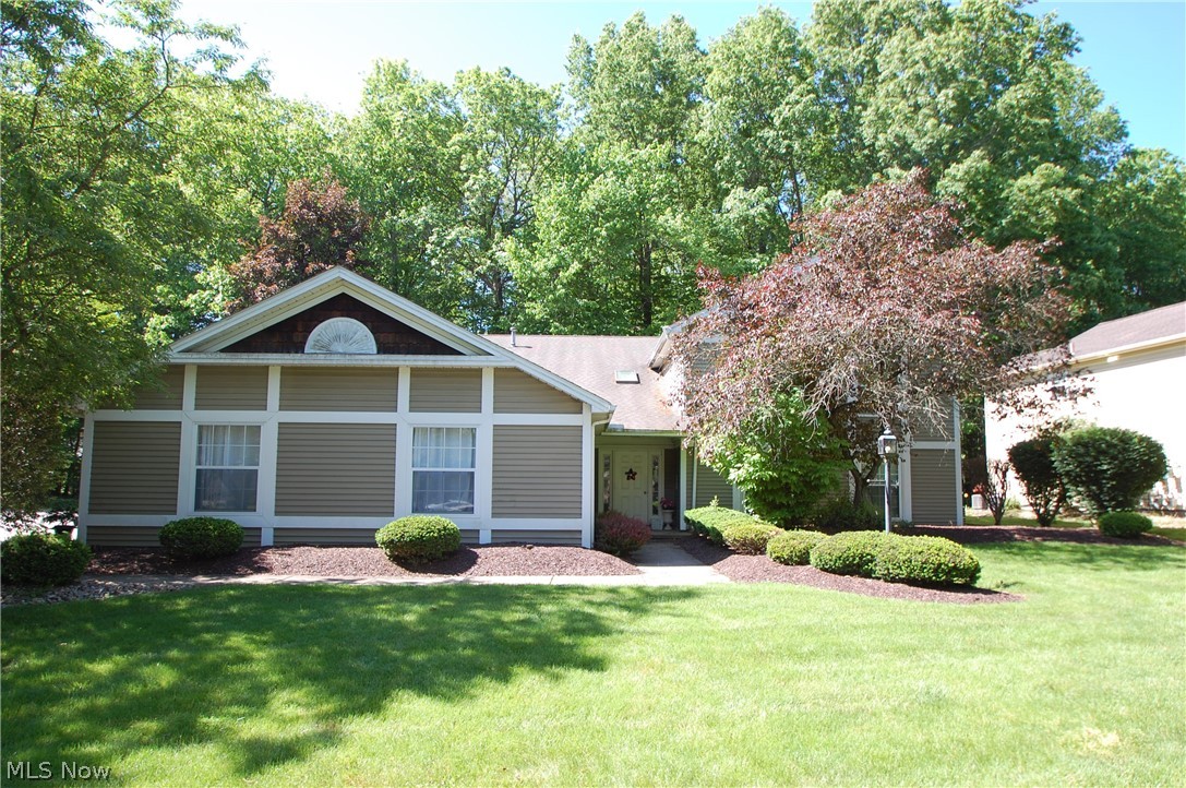 Move in ready is this  2 bedroom 2 full bath 2nd floor condo. Features a great room with/ vaulted ceilings and skylight with nice scenic views of the private wooded back yard. The kitchen/dinette area is fully equipped with appliances and a new stainless refrigerator. There is a door off the dinette to a 14x17 wood deck overlooking a park like setting. There is also a dining room and a first floor laundry with washer & Dryer included. There master bedroom is large and has a ceiling fan and a big walk in closet. There is a full master bathroom w/ skylight. There is a second bedroom and additional full bath w/ skylight. This condo has new carpet and paint and ready to be moved into.. This is all located on a private cul de sac street with many trees for a quiet setting.