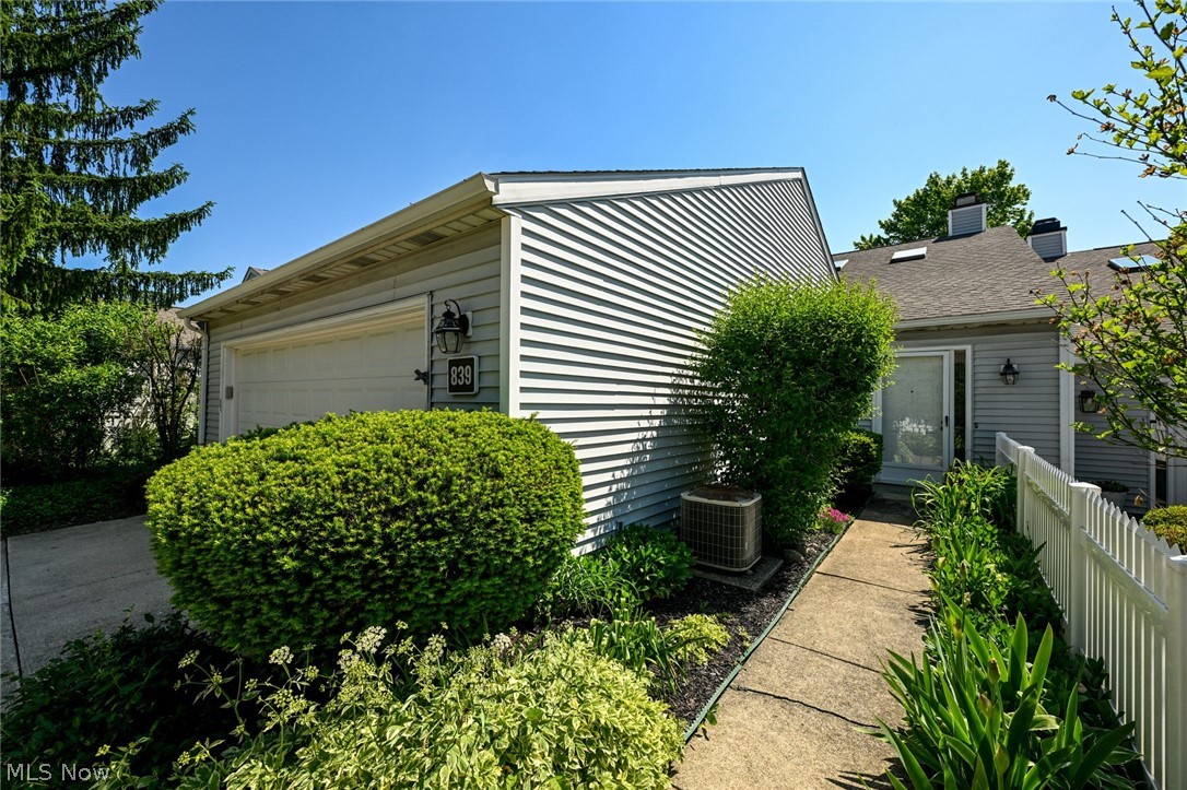 Welcome to one of the best neighborhoods in the Merriman Valley area!  Just minutes from the Seiberling Nature Realm, Metro Parks, Stan Hywet, Fairlawn country club & Summit Mall!  Eagles Chase is a low maintenance, safe community, where you will be surrounded by friendly & caring neighbors just like you!  This unit offers 2 bedrooms, 2 full baths & attached 2 car garage.  A wide foyer will welcome in your guests, w/ durable tile flooring & a large coat closet.  Impressive is the best word for this massive living room!  Vaulted ceiling, double sky lights, gas fireplace & wide opening to the dining space.  The formal dining room will comfortably fit your dining set.  You'll always feel part of the conversation while spending time in the kitchen, w/ the open wall!  Ceramic tile flooring, tons of solid oak cabinetry (including a huge pantry!), plentiful workspace, full set of updated appliances & fantastic skylight complete the kitchen.  Ultra convenient laundry/utility room off the kitchen, keeps everything accessible & provides great storage!  At the other end of the home, you will find the bedrooms & baths.  First a very spacious full guest bathroom, w/ expansive vanity top, walk-in shower & large linen closet.  Adjacent is the guest bedroom.  An amazing space w/ a large closet!  Now for the primary suite.  This substantially sized room will accommodate any bedroom set, features a walk-in closet & sliders to the private patio!  The spacious ensuite bathroom offers an extra long vanity, updated lighting & a brand new custom walk-in shower surround w/ bench seat, grab bars & multiple shower heads!  While you are here, take a peek at the patio.  A perfect space to call your own, w/ plants/greenery of your choosing!  Fenced in w/ gate to the back, sliders to the primary & french doors into the living room.  Roof 2025, Bath Fitter shower 2025, microwave 2026, range 2025, furnace 2013, dryer 2020, sliders 2005, water heater 2005, 2 windows 2002.  Hurry, Priced to Sell!!!