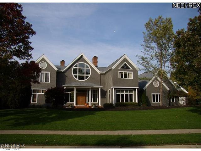 First time available for this notable waterfront home at Nobles Pond!  Architecturally significant & situated on a prime .8 acre lot with stunning water views, this home offers 4,700 sq.ft., 4-5 bedrooms & 4.5 baths.  Dramatic architectural beams, trusses, windows, & lines throughout.  A spacious foyer leads to dramatic two story Great Room w/ floor to ceiling windows to enjoy water views.  Formal dining room & warm study feature beautiful maple built-ins.  Spacious maple kitchen has walk-in pantry & dinette w/ water views.  First floor BR w/ full bath (currently used as office) also has maple built-ins.  Oversized master BR offers vaulted ceiling, fireplace, built-ins, amazing views, 2 walk-in closets & large bath.  Finished walk-out lower level has family room w/ fireplace, bonus room w/walk-in closet & full bath.  Large first floor laundry.  Fabulous 25' x 12' screened porch.  Attached two car garage plus charming, oversized detached garage.  Hurry to see!