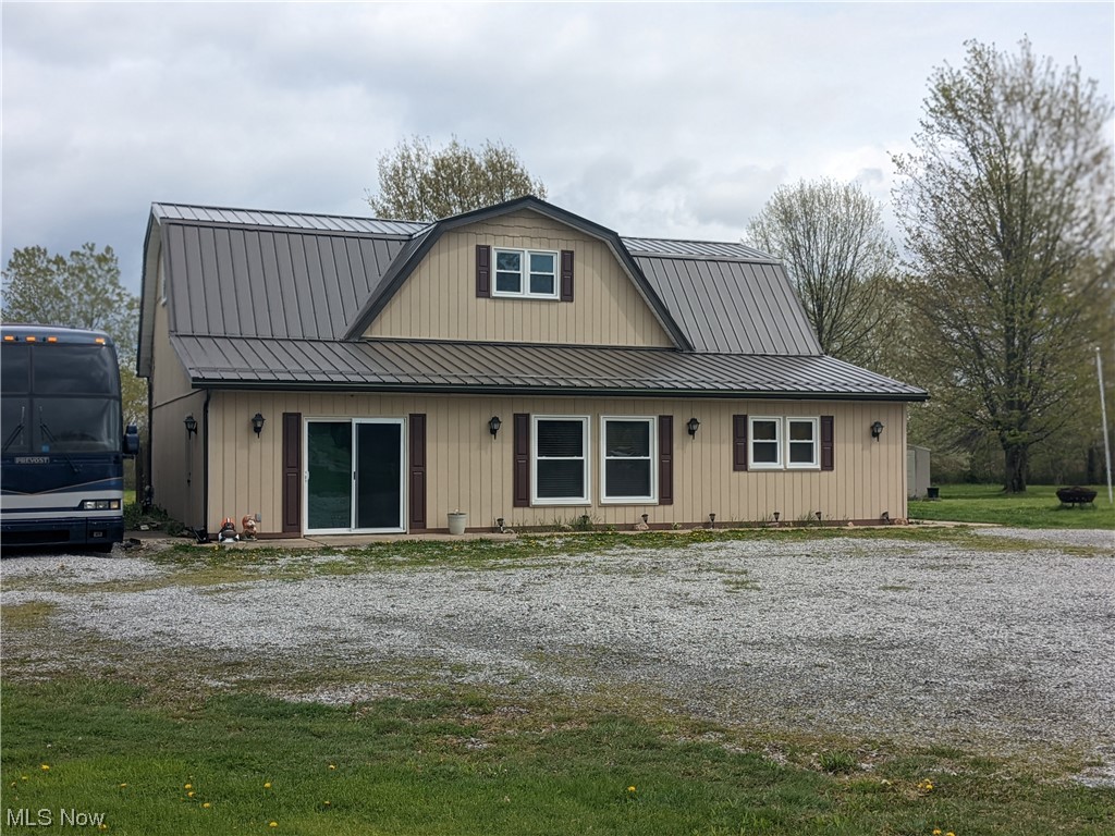 Spacious country home in Southern Lorain County's quiet Brighton Township.   This 4 bedroom home  on 7.6 acres has lots to offer!  The large eat in kitchen has a vaulted ceiling and plenty of cabinets and counter space.  The master bedroom has an adjacent bonus area, perfect for a work out room or could be converted into a nice family room  The master bath features a raised twin whirlpool tub, his and her sinks and commodes, and a walk in shower.  The second first-floor bed room has an outside entrance plus an adjacent bonus room which could serve as an additional living suite.  The second level features two nice sized  bedrooms and an additional bonus room, all awaits your finishing touches.  The home is nearly 250 feet off the road, allowing a large yard with many mature trees and providing ample sunny areas for the vegetable garden of your dreams!  New roof, windows, and siding, plus a geothermal heating/cooling system are additional benefits of this property.  Toward the rear of th