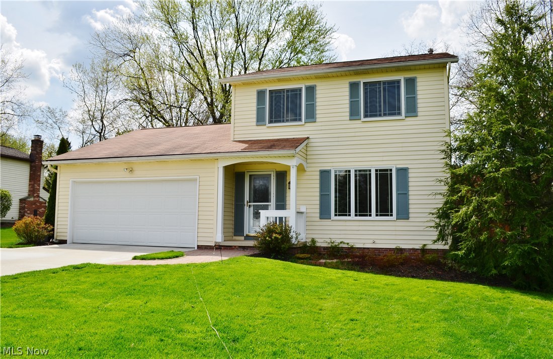 Come and see this lovely colonial on nearly half an acre in Macedonia! There are some really special features about this home. One is the awesome family room, which has a wall of windows that provide lots of natural lights. There's also a wood burning stove backed by a beautiful stone wall, both of which add character and warmth to the space. The floor plan is very open - the family room opens to the dining room and then this space opens to an updated eat in kitchen, which also has breakfast bar and sliding doors to the back deck. There's even a formal living room with nice trim and crown molding. Another feature is the main bathroom, with an updated vanity and fixtures and attractive flooring. Upstairs, there is laminate wood flooring in every bedroom! In the basement, a large laundry area and rec room are bonuses. Head outside and you will be absolutely wowed by what you find! There's a fabulous deck with partial covering, an adorable brick patio, and wonderful landscaping surrounding it all. Also outside: a large shed for storage and an above ground pool. Important updates to note include: new furnace and A/C in July 2015, concrete driveway (2012), hot water heater (2009), and exterior paint (2007) new living room carpet, and Anderson windows throughout. Don't miss the opportunity to own this move in ready home!