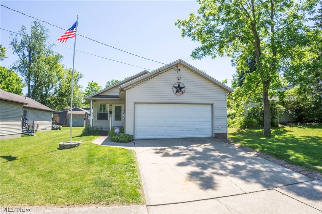 Welcome home to 906 Ivor Ave! Move right into this well-maintained 3-bedroom, 1-bath ranch tucked away on a quiet dead-end street in Akron. Built in 1999, this home offers the convenience of one-floor living with a functional layout and a fresh, inviting feel throughout. Recent interior paint gives the home a clean, updated look, making it easy for the next owner to settle in and make it their own. The bright living space flow seamlessly into the three bedrooms and full bath, providing comfortable living in an efficient 984 square feet. Downstairs, the full unfinished basement offers abundant storage and excellent potential for future living space, a home gym, workshop, or hobby area. The attached two-car garage adds convenience, while the fully fenced backyard provides plenty of room for pets, play, gardening, or relaxing outdoors. If you're looking for a move-in-ready home with low-maintenance living, a private backyard, and a peaceful location, this ranch deserves a spot on your must-see list! Schedule your favorite Realtor for a private showing today!