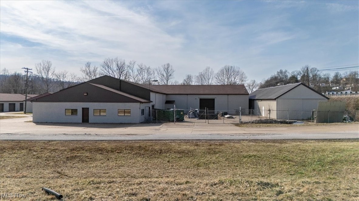 Multi - building industrial park located in Parkersburg, WV.  Features a 10,000 Sq ft Building with front offices. This site has 8 additional 2,700 open span buildings for multiple uses making up a total of approximately 30,000 under roof square footage. 2 parcels totaling approximately 8 acres.