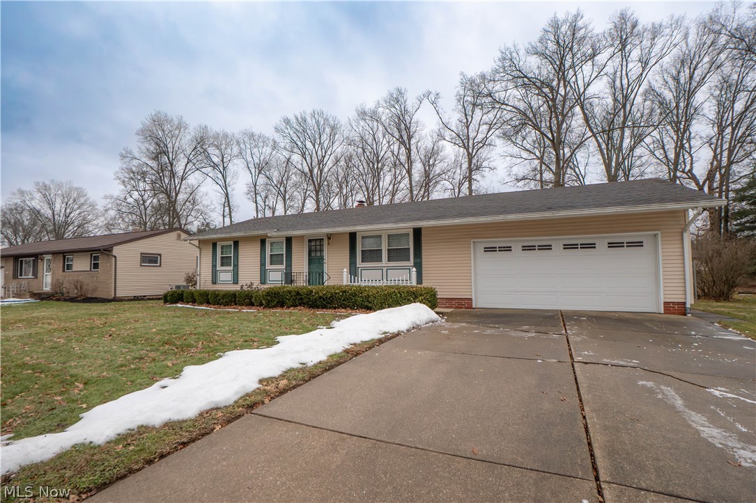This adorable ranch in Southern Oaks is full of charm and ready for its next chapter! With great curb appeal, a welcoming front porch, and a sweet storm door entry, this home feels warm from the moment you arrive.

Inside, you’ll find beautiful hardwood floors throughout the living room and all three bedrooms, giving the home a cozy and timeless feel. The bright eat-in kitchen offers plenty of cabinet space, a breakfast bar, and sliding doors that lead right out to the patio—perfect for summer dinners and morning coffee. Built-in hallway storage and a charming bookshelf in one bedroom add extra character and function.

The full bath is in great condition with a large mirror, shower bench, and handrails for added convenience. Downstairs, the full unfinished basement (with access through the garage) provides tons of storage and future finishing potential.

Step outside to enjoy the flat, partially fenced yard featuring a brick paver patio and plenty of space to relax or play. Major updates include an electrical box with GFI outlets (2018), Carrier furnace (2022), central air (2023), and hot water tank (2023).

Cute, clean, and well cared for—this one is easy to love!