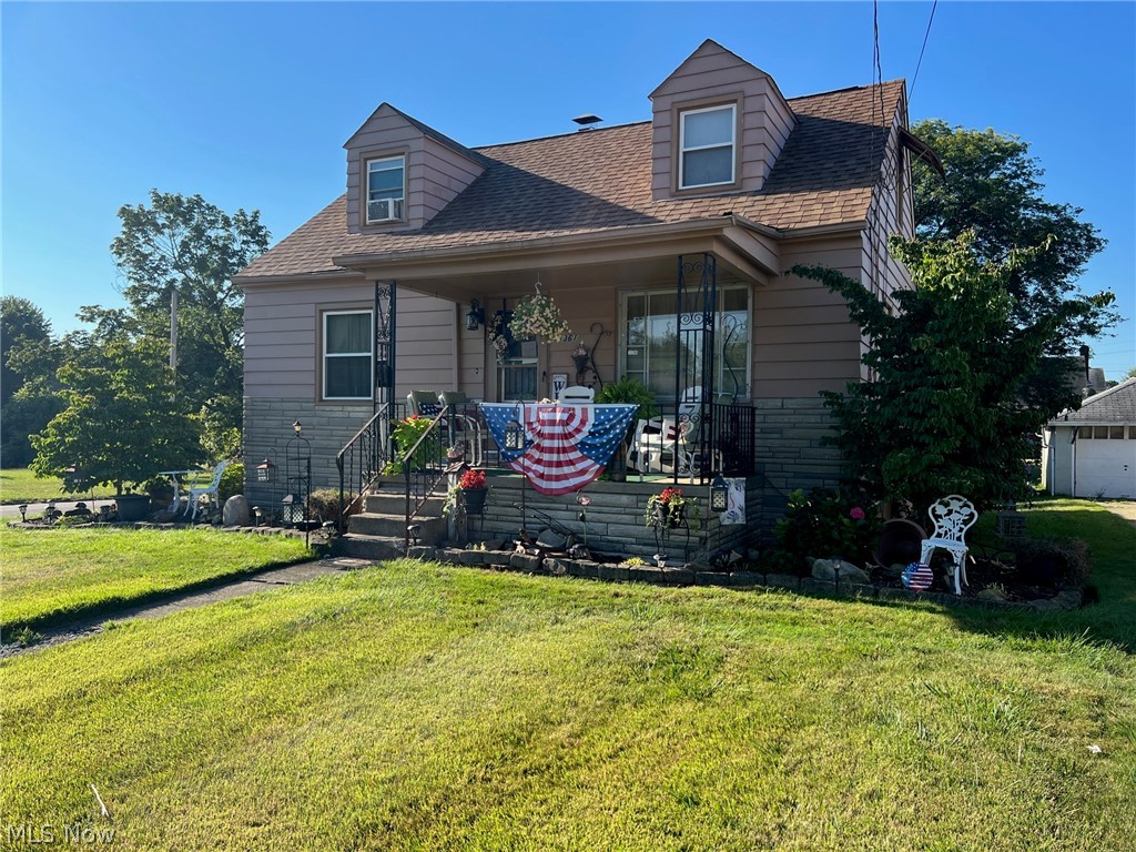 Adorable, Immaculately Maintained 3 Bedroom Cape Cod on a Corner Lot with TONS OF UPDATES! Updates include: New Roof 2020, New Deck 2018, Furnace 2014, Exterior Painted 2020, Kitchen remodeled 2012 including new plumbing, electrical, cabinets and counter, Kitchen Island added 2020, Bathroom Completely remodeled in 2020 including New Plumbing, Electrical, Walk-in Shower, Vanity and more! The Kitchen hosts plenty of cabinets and counterspace which are accentuated by Beautiful Tile Backsplash. The Large Dining Room w/Hardwood Flooring & Huge Closet is the perfect place to host a dinner party or enjoy family meals. The first floor is also home to the Spacious Living Room, Bedroom and New Full Bath. Upstairs you will find 2 Oversized Bedrooms, both with Hardwood floors. The Lower Level has been partially finished to include a Roomy Family Room and Humongous Rec Room w/Built In Bar. Outside you will find a  nice sized Front Porch as well as a newly added, Massive Rear Deck perfect for enjoyi