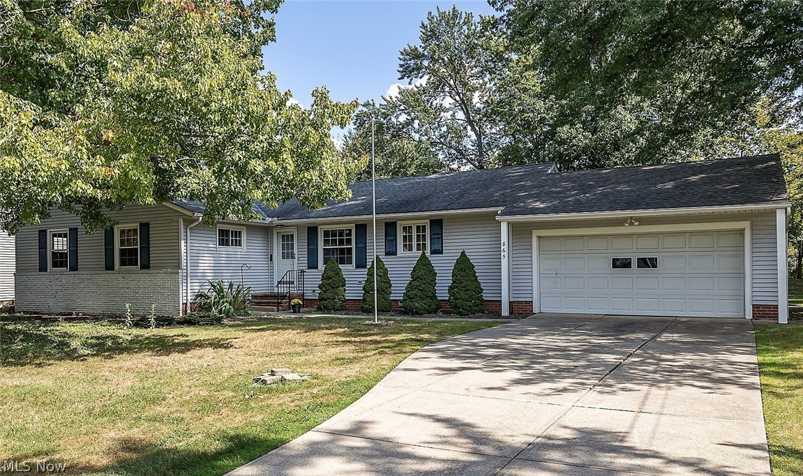 One floor living at its best!  Sharp Ranch with 4 bedrooms, 2.5baths on a gorgeous street in Highland Heights. Large Eat-in kitchen offers ample cupboards & counterspace, built-in cooktop and stove and linoleum tile flooring. Spacious living room with a fireplace, built-ins, hardwood floors & a set of sliders that lead you to your lovely sunroom that overlooks your park-like yard and another set of doors that lead you to your large Trex Deck. Lower level offers a recreation room, workshop and huge storage area.  Updated furnace, humidifier, water tank and windows.  Convenient location close to I-271 & I -90, shopping, schools and dining.  Home Warranty provided. Move right in and make it HOME.