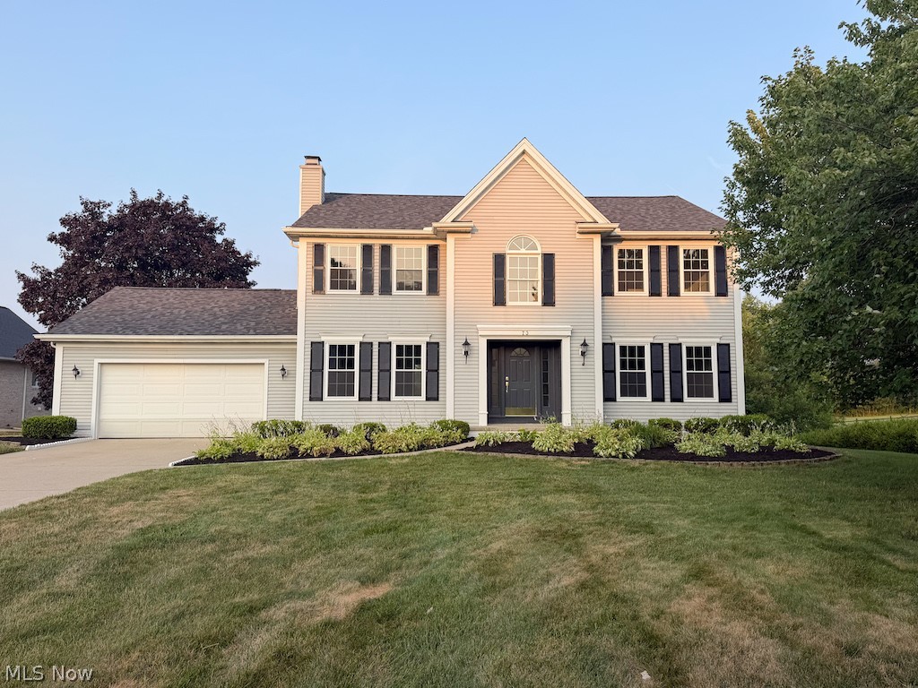 Rare lakefront offering in Hinckley. Sited on 1.4 acres with sweeping views of the water, this 4-bedroom, 4-bath home makes its impression the moment you step into the soaring two-story foyer. The kitchen is finished with white shaker cabinetry and quartz counters — clean, timeless, and built to last. The family room anchors the main level, highlighted by a custom bar combining rich wood, white quartz, and gold fixtures. The primary suite delivers a spa-caliber retreat with a deep soaking tub and separate walk-in shower. The walkout lower level opens directly to the yard, extending the living space outdoors and creating a natural flow to the acreage and lake beyond. With four full baths, generous room sizes, and land that's increasingly hard to find at this price point, this is a property that lives as well day-to-day as it shows. Convenient to Route 303 and I-71, minutes from Hinckley Reservation. Schedule your private tour.