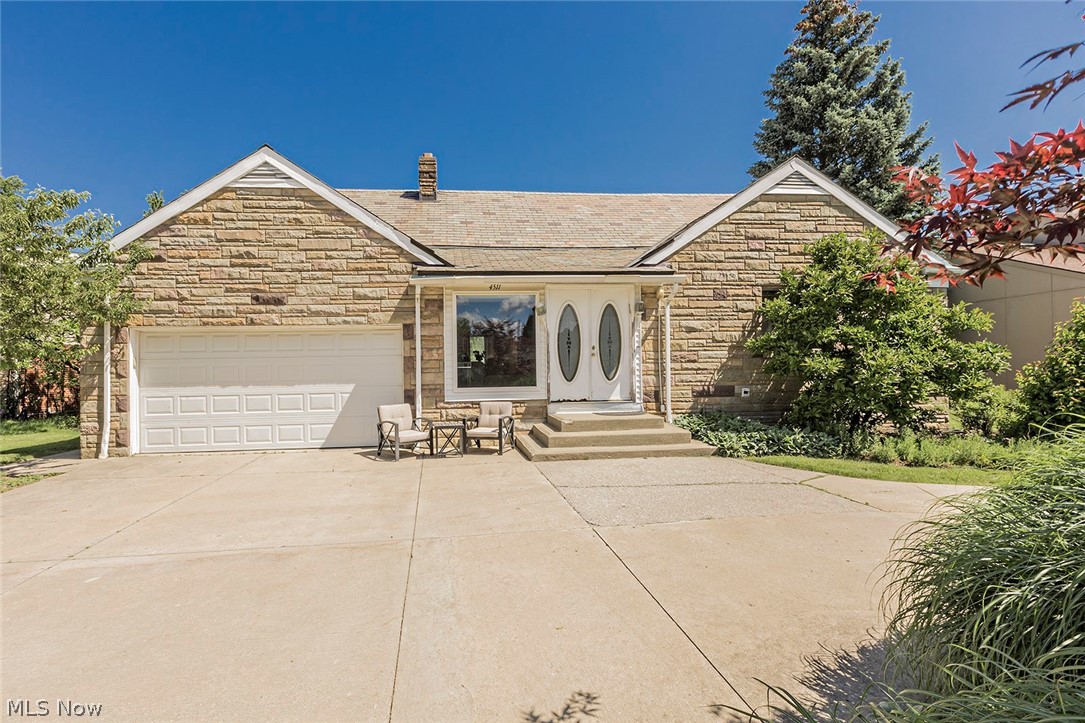 Location, Location, Location! Welcome to this amazing 5 bed, 4.5 bath home on the most highly sought after street in UH! The circular driveway leads you into a dramatic open floor concept as soon as you walk into the home, with Asian Maple wood floors,  custom built-in shelving/cabinets and recessed lighting! Past the living room, flowing into the breakfast/ eat-in kitchen area, is an immense and bright kitchen with granite counter tops, and TWO sets each of stainless dishwashers, microwaves, ovens and sink, not to mention the extra wide fridge. The dining room with beautiful crown molding has access to back patio and looks over wonderful backyard through the wall of windows that bring plenty of natural light to the space. The first floor contains 3 bedrooms, including the master bedroom with walk-in closet and master bath. The first floor is complete with an additional full and half bath, with all baths being updated,  1st floor laundry, and private access to backyard near the attached 2 car garage. The upstairs with plenty of closets and storage space includes a large in-law suite with private full bath, with walk in shower and Jacuzzi tub. The finished basement features carpeted rec room, 5th bedroom with egress window, bonus room, full bath and plenty of storage space. The incredible backyard includes patio, in-ground pool, and privacy fence wrapping around the spacious yard and oasis like landscaping. Seconds from S. Green Rd. with so much to offer, a must see!!!