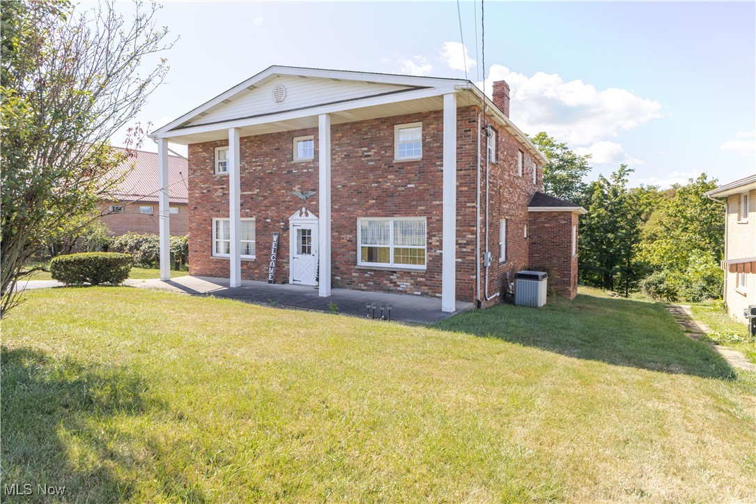 This beautiful colonial home is everything you’ve been searching for—four large bedrooms, three bathrooms, and nearly 3000 sq. ft. of living space nestled on a generous one-acre lot in the heart of Weirton. If you’ve been craving extra space and a touch of privacy, this is the perfect place to call home.

With its timeless charm and classic design, this home offers the ideal balance of space and comfort. The four spacious bedrooms provide plenty of room for your family, while the three bathrooms ensure everyone has their own space. The expansive living areas are perfect for both relaxation and entertaining.

Step outside to enjoy your own private oasis on a large, well-maintained one-acre lot—a rare find in the area! Whether you're hosting outdoor gatherings or simply enjoying the peaceful surroundings, this property offers the perfect blend of privacy and convenience.

A massive two-car garage behind the house gives you plenty of space for vehicles, storage, or even a workshop.

If you're looking for a home with ample space, privacy, and a great location, this colonial beauty checks all the boxes.

Call today to schedule a private showing before this one is gone! This opportunity won't last long.