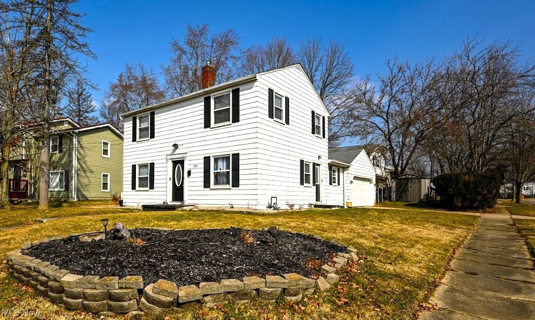 Be prepared to fall in LOVE with this 4 bdrm,  2 1/2 bath colonial that is MOVE IN READY boasting over 1,800 sq. ft. of FINISHED living space !! Attached 2 car garage on a large corner lot, FENCED IN back yard perfect for kids & pets, plus a patio ready for cookouts. Excellent location with sidewalks and walking distance to schools. 
The spacious living room with hardwood flooring is perfect for entertaining with plenty of windows for natural light. 
The galley style Kitchen has abundant cabinet space with CATHEDRAL ceilings, tile flooring, recessed lighting and all NEW STAINLESS STEEL APPLIANCES. Conveniently located on the main floor is a full bath, half bath and FIRST FLOOR LAUNDRY off of Kitchen with washer & dryer that STAY!  Plenty of dining space to sit and enjoy a hot meal in the eat in Kitchen or dedicated formal dining room. Upstairs you will find all 4 bedrooms with new carpet and a full bath , all freshly painted. Need more room to roam, the NEW partially finished basement/rec room is the perfect place to hang out with family and friends. 
This home has many updates including: NEW PAINT through out 2024 ,NEW APPLIANCES in kitchen 2024, NEW CARPET in bedrooms,  partially FINISHED BASEMENT with carpet 2024; NEW GARAGE DOOR and opener 2023 ;NEW FURNACE, CENTRAL AIR &  sewer line to street and WATERPROOFED basement in 2020. New HOT WATER TANK 2016.