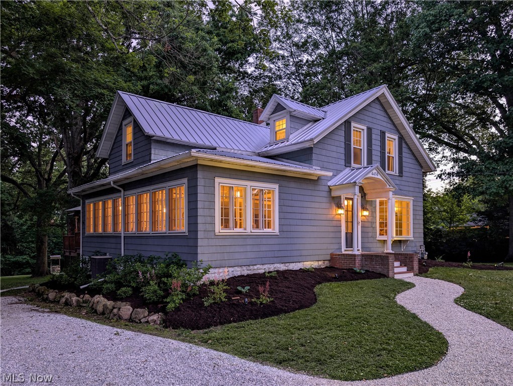 Circa 1880 | 3+ Acres | Silver Creek Metro Park

A rare opportunity to own a thoughtfully restored historic farmhouse on just over three private acres near Silver Creek Metro Park. This 2,000+ sq. ft. home blends preserved character-wide-plank floors, reproduction hardware, custom built-ins, stone fireplace, and brass details-with modern updates, including a renovated kitchen and bath. Major improvements include a metal roof, new septic system, updated plumbing and electrical, well pump, water softener, wood stove, appliances, and generator hookup. Mature oaks, a stream, expansive sunroom, multi-level deck, and two historic bank barns create a peaceful retreat just minutes from shopping and dining.