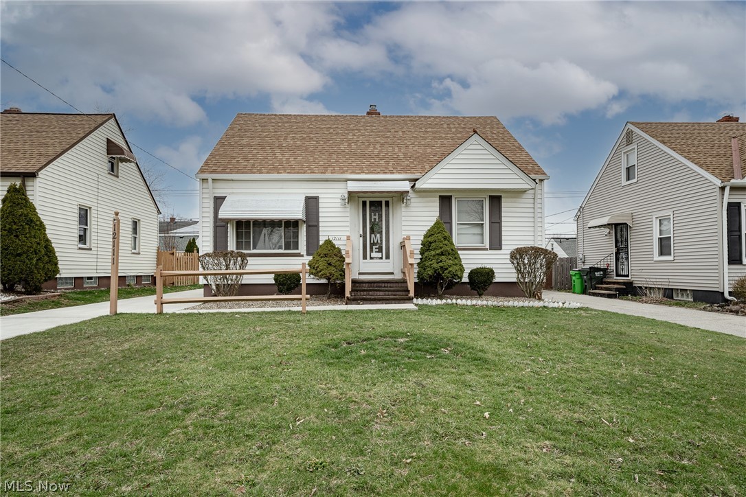 Move right into this charming cape cod in Garfield Heights! This well-maintained home features over 1400 square feet of finished living space with 3 bedrooms, 1.5 bathrooms, spacious living areas, and several recent updates! The front door opens into a the large, bright living room that features hardwood floors. Head back the the kitchen where you will find plenty of natural light, a cozy eat-in area, and crisp white appliances. There are two bedrooms on the first floor and a well-kept full bathroom. Upstairs, there is a very large third bedroom that spans the whole width of the home. The lower level includes a very spacious rec room, a half bathroom, a storage area, and a laundry area with a newer washer and dryer. Additional recent updates include a newer electrical panel and water tank and new central AC in 2020. Outside, there are well-kept garden beds, a lovely back patio, and a back yard that would only need a gate to be fully fenced in. Located just off of Turney Rd, just minute