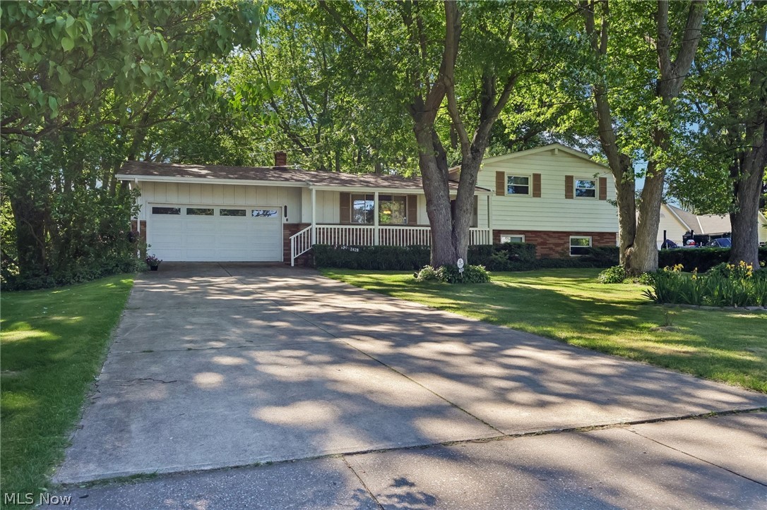 Welcome to 2428 Antioch Road in North Perry! Offered for the first time since it was built in 1968, this well-cared-for home sits on nearly 2 acres and reflects decades of pride in ownership. The same family has lovingly maintained and enjoyed this property for generations, creating a rare opportunity for its next owner.

Step outside and discover one of the property's most special features—a beautifully landscaped yard that has been thoughtfully planned, cultivated, and cared for over many years. Mature plantings, established gardens, and seasonal color create a peaceful outdoor setting that can be enjoyed throughout the year.

With nearly 2 acres, the property offers abundant space for gardening, hobby farming, outdoor projects, or simply enjoying the extra room to spread out. Whether you're dreaming of raised garden beds, a greenhouse, fruit trees, or a homestead-inspired lifestyle, the possibilities are plentiful.

Located in North Perry, residents benefit from municipal services that include water, sewer, trash, and cable, providing added convenience and value. The property is also conveniently situated near Lakeshore Reservation Park and the shores of Lake Erie, offering easy access to outdoor recreation, scenic lake views, walking trails, fishing, and opportunities to enjoy the natural beauty of the area.

Built in 1968 and cherished by the same family ever since, this property presents a unique opportunity to own a home with a rich history, established landscaping, and room to grow. Combining nearly 2 acres of usable land, a beautifully cultivated setting, and a convenient location close to local amenities and Lake Erie attractions, 2428 Antioch Road is ready for its next chapter.