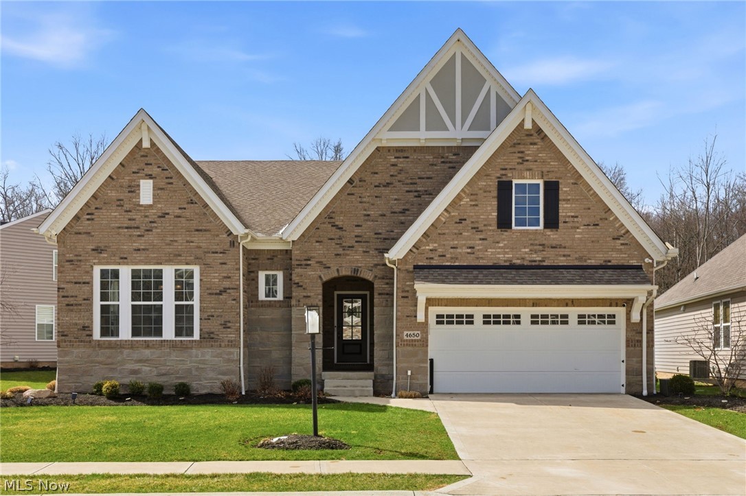 Welcome to your dream home in the heart of Westlake. This exceptional Drees-built residence, featuring the highly sought-after Finley floor plan, was originally the community’s model and is now offered by only its second owner. Thoughtfully designed with upscale finishes and abundant natural light, the home showcases soaring ceilings, rich wood flooring, and a striking two-story family room. The open-concept layout effortlessly connects the living, dining, and kitchen spaces—ideal for both everyday living and entertaining. The chef’s kitchen is a true centerpiece, featuring quartz countertops with waterfall edges, an oversized island, a five-burner gas cooktop, and premium appliances. The first-floor primary suite offers a spa-inspired bath with dual vanities and a generous walk-in closet. Two additional main-level rooms provide flexibility. Upstairs, a private suite with a full bath and walk-in closet is paired with a versatile loft space. The recently renovated lower level added 1000 square feet to the home and is an entertainer’s dream space, featuring with an upscale wet bar, additional dining area, game room, media room, home gym, office, and a wine room that could easily convert to a bedroom with its attached full bath. The sellers also added a patio designed for year-round enjoyment, with major upgrades like a hot tub, fire pit, outdoor kitchen, retractable screens. Meticulously maintained, the home includes freshly painted interiors, serviced systems and appliances, added ceiling storage in the garage, and a new 240v electric vehicle charger. These sellers spared no expense maintaining the home, and its new owners will reap the benefits. This low-maintenance community has an active HOA with strong reserves and is within walking distance to the Metroparks and less than ten minutes from Crocker Park. This home is an exceptional, truly turnkey opportunity.