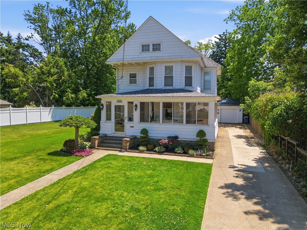 This meticulous 4 Bedroom 2 Bath Colonial is situated on the Shores of Lake Erie…within walking distance to Walnut Beach and Historic Bridge Street! This rare property offers stunning Lake Views and is nestled on two lots totaling 0.43 acres—providing space, privacy, and endless potential. The updated kitchen truly serves as the heart of the home… with its large kitchen island, granite countertops, and ceramic tile…perfect for gathering and entertaining. Throughout, you’ll find exquisite original woodwork, crown molding, and classic pocket doors that showcase the home’s character throughout, while blending seamlessly with modern amenities. Enjoy peaceful mornings and relaxing evenings on the enclosed porch, complete with ceiling fans—an ideal space to unwind while taking in the lake breeze. The layout offers spacious closets throughout, a convenient first-floor laundry (with the option to convert into a main-level bedroom), and three bedrooms upstairs along with a 4th Bonus room, ideal for a home office or flex space. A full-size attic provides even more opportunity for additional living space, while the full walkout basement offers excellent additional storage. Outside, the property continues to impress with a detached garage and an additional outbuilding—perfect for storage, hobbies, or recreational equipment. Located just minutes from the library, museums, tennis and pickle ball courts, shopping, dining, multiple marinas, kayaking, and boat rentals. This Home places you in the center of everything the Ashtabula Harbor lifestyle has to offer. A Harbor gem that is truly one-of-a-kind…a rare opportunity you won't want to miss…Schedule your showing today!