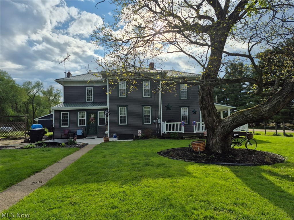 If you're looking for a fully updated farmhouse with two barns, an historic smoke house, and two acres ready for your dream to come to life, this is YOUR paradise! The seller's father-in-law was also the original owner and builder of the home. Updates include: roof (2019), siding (within the last 6 years), 6-inch gutters (2025), partially-covered wrap around porch (2023), luxury vinyl plank waterproof flooring throughout the first floor (over the last 5 years), updated bathrooms, newer vinyl windows, new paint throughout the first floor, original woodworking, original built-ins... AND MORE! Schedule your showing ASAP as this one will not last.