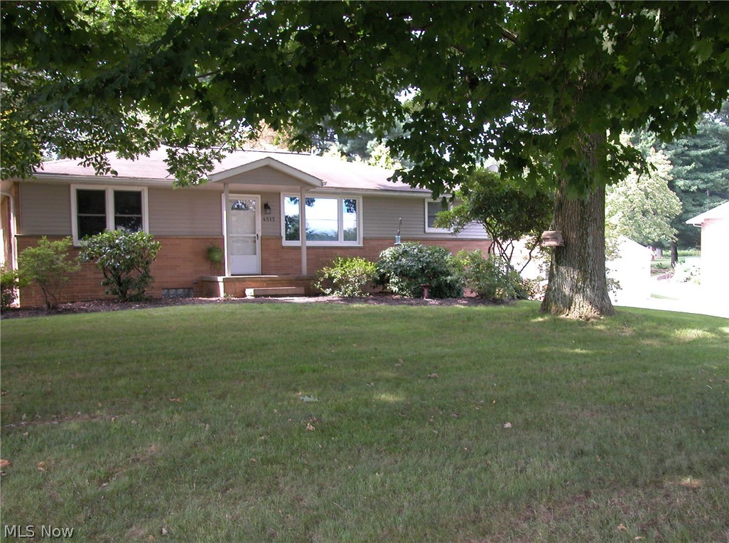 Completely remodeled and updated Brick Ranch in Triway SD with great views of the rolling countryside. Nestled among mature trees and landscape with beautiful stone patios, walkways and sittting areas in the back yard.  2 car attached garage PLUS 24 x 32 Detached Garage with electric, room for vehicles, toys and workshop.  Many updates that include newer windows, doors, wood trim, Furnace, AC, Electrical wiring, panel and devices, baths, plumbing and fixtures. Finished lower level with full bath and utility room. See our complete list of improvements.  Open Living room and Dining Room with large windows to take in the views from the front of the home.  Bueatiful and private backyard where you can enjoy the flowers, trees, birds and tranquility. Plenty of open grassy area for pets and kids or garden.  Desirable Country Home and setting.