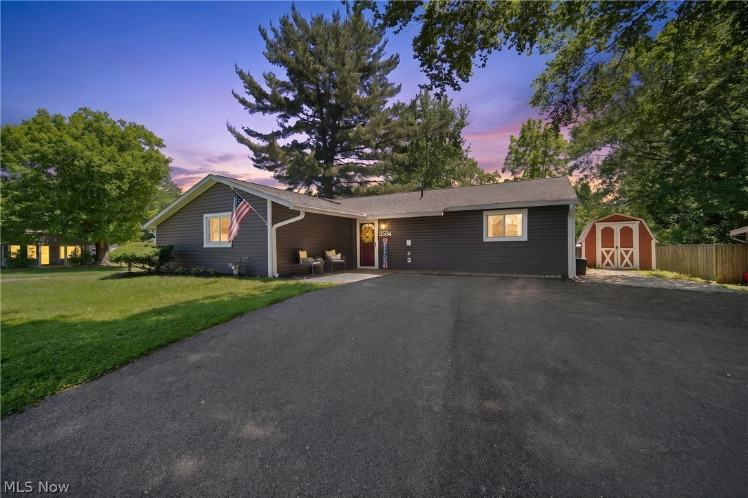 Welcome Home to this lovely Ranch at 3594 Hanover Drive! Recent updates are sure to impress you! Driveway paved in 2022! Windows (some), Siding, Roof, Skylight, De-Icing Cables on Gutters and Storm Door in 2024! Remaining windows in 2019 along with the HWT, Furnace and A/C! All big ticket items are done! All appliances including washer and dryer stay! Nice open layout with a large family room and corner fireplace! Large kitchen open to family room! 3 bedrooms, 1 full and 1 half bath! Laundry nook off of kitchen! Great entertaining house with nice space! Easy access to highways, shopping and restaurants! One Year Home Warranty offered by sellers! Tesla charger is negotiable! Dont' miss this one!