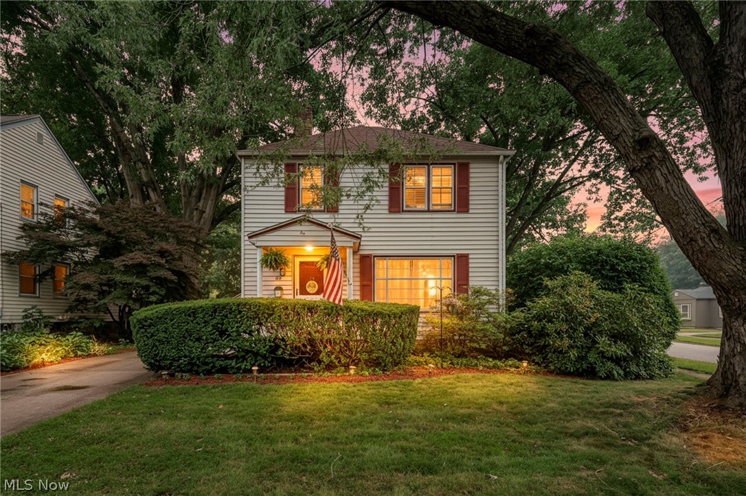 Nestled on a picturesque corner lot in the heart of Cuyahoga Falls, this charming 1944 Colonial has been lovingly cared for by only two owners throughout its lifetime. Blending original character with modern updates, 86 Washington Ave offers timeless appeal with the peace of mind today's buyers are looking for. Step inside to discover beautifully restored original hardwood floors, a sun-filled living room anchored by a large picture window, and a formal dining room featuring classic wainscoting that adds warmth and charm. The renovated kitchen is both stylish and functional, featuring crisp white cabinetry, white quartz countertops, stainless steel appliances, polished brass hardware, and a farmhouse sink that serves as the centerpiece of the space. Upstairs, you'll find three comfortable bedrooms with recently installed luxury vinyl plank flooring and a remodeled full bathroom, creating move-in-ready living from top to bottom. One of the home's most inviting spaces is the enclosed three-season room—the perfect spot to sip your morning coffee, curl up with a good book, or enjoy the feeling of being outdoors without worrying about the weather or mosquitoes.
Outside, the park-like corner lot provides plenty of room to entertain, garden, or simply unwind, while the oversized one-car garage provides storage and everyday convenience. With major updates already completed and room to add your own personal touches over time, this home is ready for its next chapter. Walking distance from downtown Cuyahoga Falls, Front Street events, parks, restaurants, and the Cuyahoga River just minutes away, you'll enjoy a lifestyle that's every bit as appealing as the home itself.