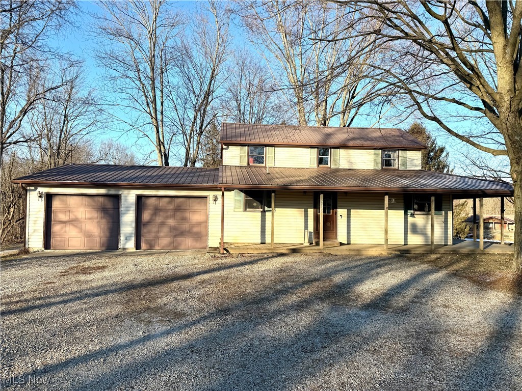 Motivated Seller! Loads of potential with this 3BD, 2BA home in Lakewood Schools! This house is tucked away on 1.13 acres and is conveniently located near Interstate 70 and State Route 13 making it the perfect place for the commuter. Upstairs you will find the master bedroom with an attached bath and an over sized closet offering loads of storage space. The 2nd bedroom upstairs has an additional flex space attached which could be used as an office, additional closet or a nursery. On the main level you will find hardwood floors throughout, first floor laundry, a full bathroom, large dining room, a 3rd bedroom, as well as two living rooms! One of the living rooms has a wood burning fireplace and a bay window allowing plenty of natural light to flow through. The additional living room has a sliding glass door leading outside to the wrap around porch. You will also love the huge attached garage for all your storage needs!