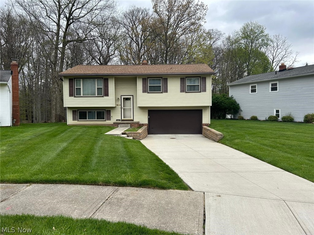 Welcome to this well-maintained bi-level home located in the heart of Bedford Heights, offering a comfortable and functional layout with 3 bedrooms and 2 full bathrooms. This property features a 2-car attached garage providing ample parking and storage, along with a finished lower level that adds valuable additional living space—perfect for a family room, home office, or entertaining area.

Step outside to a rear deck ideal for gatherings, outdoor dining, or simply relaxing. The home also includes a recently updated concrete driveway, central air conditioning, and a water softener for added everyday convenience. Major improvements have been completed over the past 5–10 years, including a solid, well-maintained roof.

Ideally situated near I-271 and I-480 for an easy commute, and just minutes from Bedford Reservation and local parks, this home offers a practical combination of space, location, and functionality in an established neighborhood.
