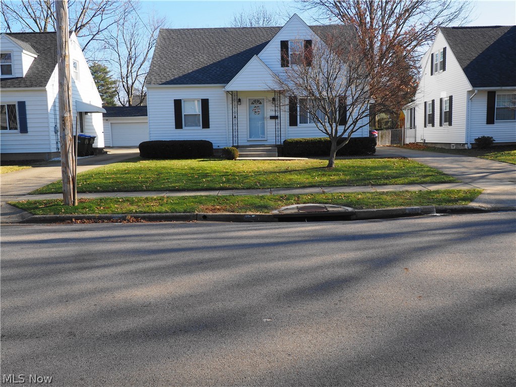 Lot:  50' X 121'  Roomy, well maintained cape.  Applianced kitchen with plenty of cupboards and granite counters, great wall oven and countertop gas range plus a new microwave make cooking and being in the kitchen a pleasure. Updated bathroom.  The roof was replaced on the house and garage in 2021 also with new gutters and downspouts.  The exterior was freshly painted in  July 2021.  Furnace is about 8 years old, central air 2017 and hot water tank 2020.  The bedroom up has been updated with laminated floors and a new ceiling plus built-in storage and large closets.   The basement has a large recreation room and the basement has been waterproofed plus a back-up water valve was installed in 2019. Glass block windows in the basement. If you like DIY projects there's a workshop with a work bench. 2 car garage with a paved drive and extra parking spaces.  A one year home warranty is also included.