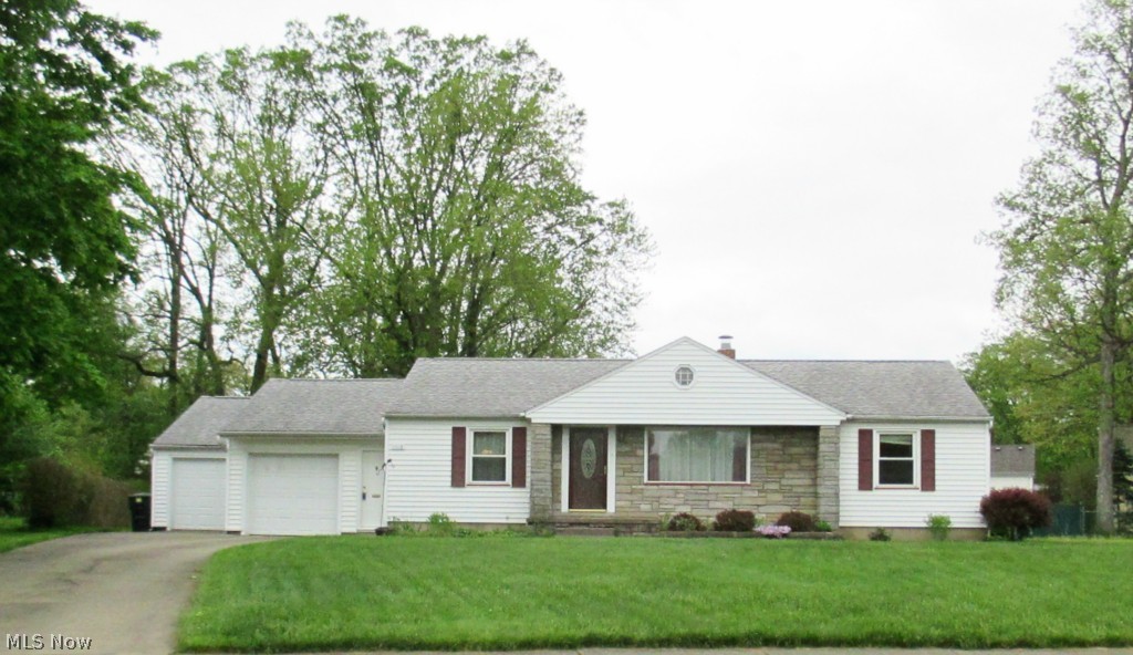 Beautiful ranch, formal living and dining room, 3 bedrooms, hardwood flooring in most rooms.  Awesome updated kitchen with breakfast bar.  Bath remodeled 2013 with tiled shower, 10x14 heated sun room.  Large lot, 2-car garage, paved drive.  Third bedroom is currently used as a den.