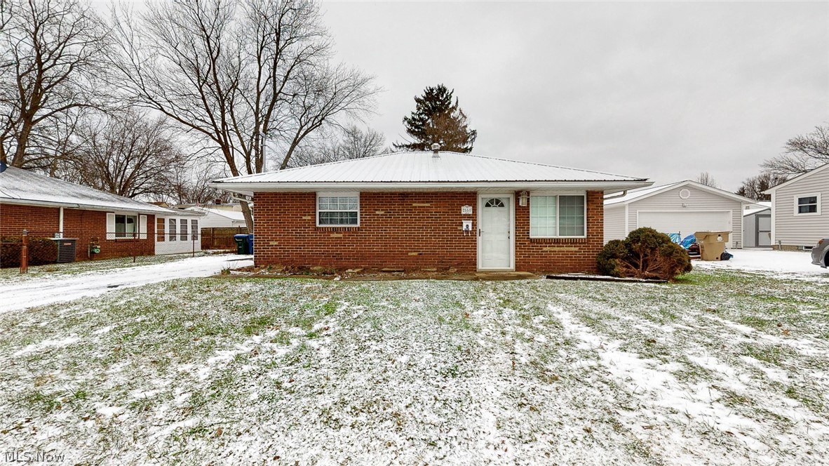 Are you looking for a well kept updated little house to buy in the Falls and call home? Here it is an affordable all brick home you can buy close to public transportation and on a dead end street. Home offers care free living a home warranty, all brick 2 bedroom 1 bath 2 car garage all updated, some of the updates include replacement windows 10 yrs, metal roof 2020, newer furnace, elec updated 5 yrs, remodeled bath with walk in shower & kitchen all  clean and tidy nicely updated. Move in condition.