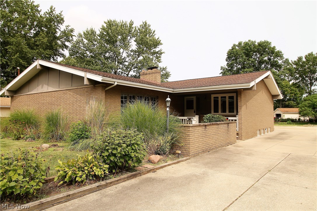 Welcome home to this stunning totally remodeled three bedrooms, three full bath ranch home. There are so many updates like new paint (2020), new high end flooring (2020), and new fixtures through out.  This home is so clean and gorgeous. The large family room with carpet and fireplace, offers huge windows to let the natural light shine through. The exceptional, bright and cheerful kitchen offers an abundant of soft close cabinets, granite countertops, stainless steel appliances, crown moldings and eat in area. The huge living room is open to the kitchen and has doors leading to one of the master suites. So much room for entertaining, relaxing etc. There are three bedrooms with new closet doors (2020) on the main level, two master suites with remodeled full bathrooms. Lower level offers another family room/media, recreation room, wet bar, laundry room with nature stone floor, workshop and a full bathroom. WOW! So much room!  There is a two and half attached car garage that offers door o