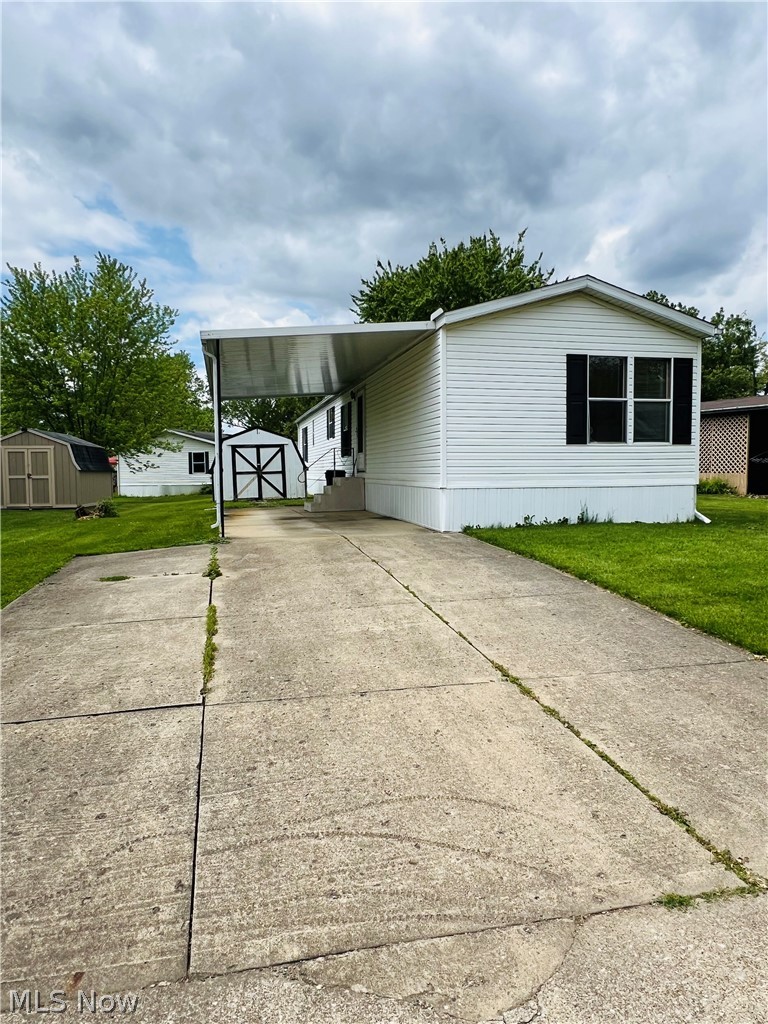 Open House Saturday, June 6, 2026, 11:00am - 1:00pm.
THIS clean, comfortable, move-in-ready 3-bedroom, 2-bath single-wide 2000 Palm Harbor home located in the peaceful and well-kept Forty Corners Mobile Park. Home features private primary bedroom, two additional bedrooms w/roomy closets and good kitchen cabinet space, all appliances stay. Outside includes a vinyl deck, storage shed and private driveway parking space. Pet-friendly (1 dog/1 cat). Perfect fit for families, downsizers or anyone looking for an affordable place to call home.  Easy access to major roads, close to shopping, dining and local amenities. Clubhouse available for event rental ($40).  Land lease fee includes water, sewer, trash, road snow plowing.  Buyer must be approved by Association prior to contract acceptance - Application process is free online. Sellers are motivated!! Check it out before it's gone!