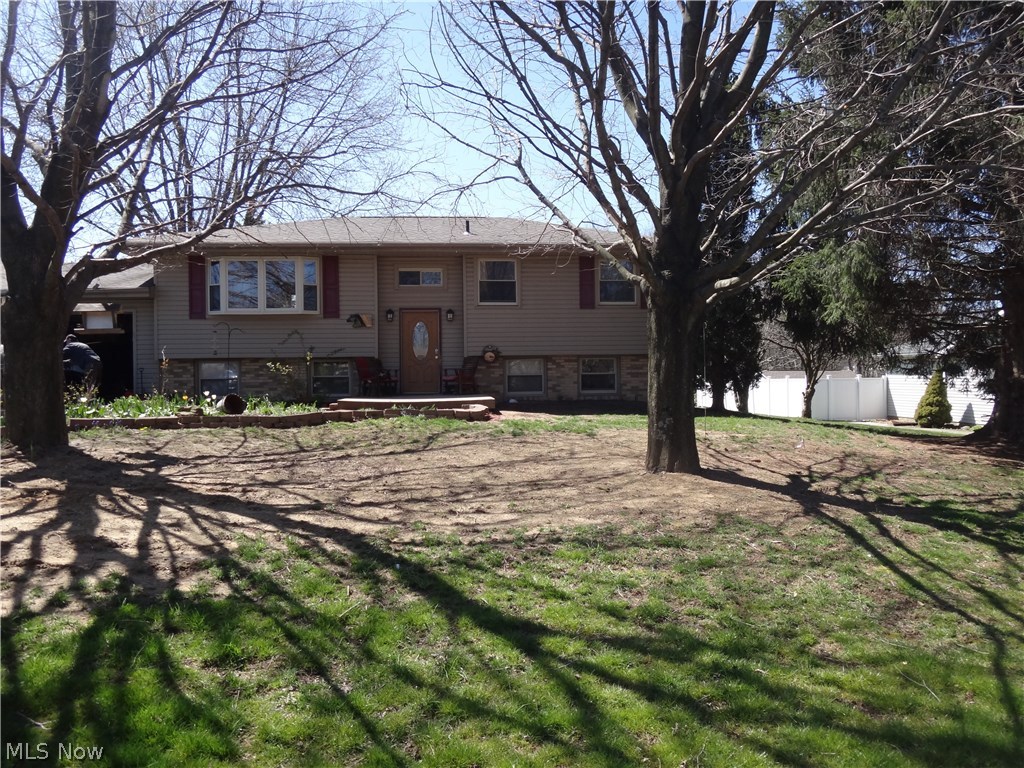 Lovely bi-level home in St. Clair Township sitting on almost a half acre.  The main floor features living room, dining area, kitchen, 2 bedrooms and full bath.  The dining area has sliding glass doors to a large 16X14' deck overlooking the back yard.  Kitchen has beautiful oak cabinetry and corian counter tops that are only about 8 yrs. old.  The lower level is finished and features a spacious family room with a propane gas fireplace, 1 to possibly 2 more bedrooms, full bath, and laundry room.  Walk out from lower level to a nice backyard with fruit trees.  Roof was replaced in 2011. Two car attached garage and paved driveway.  Beaver Local Schools.