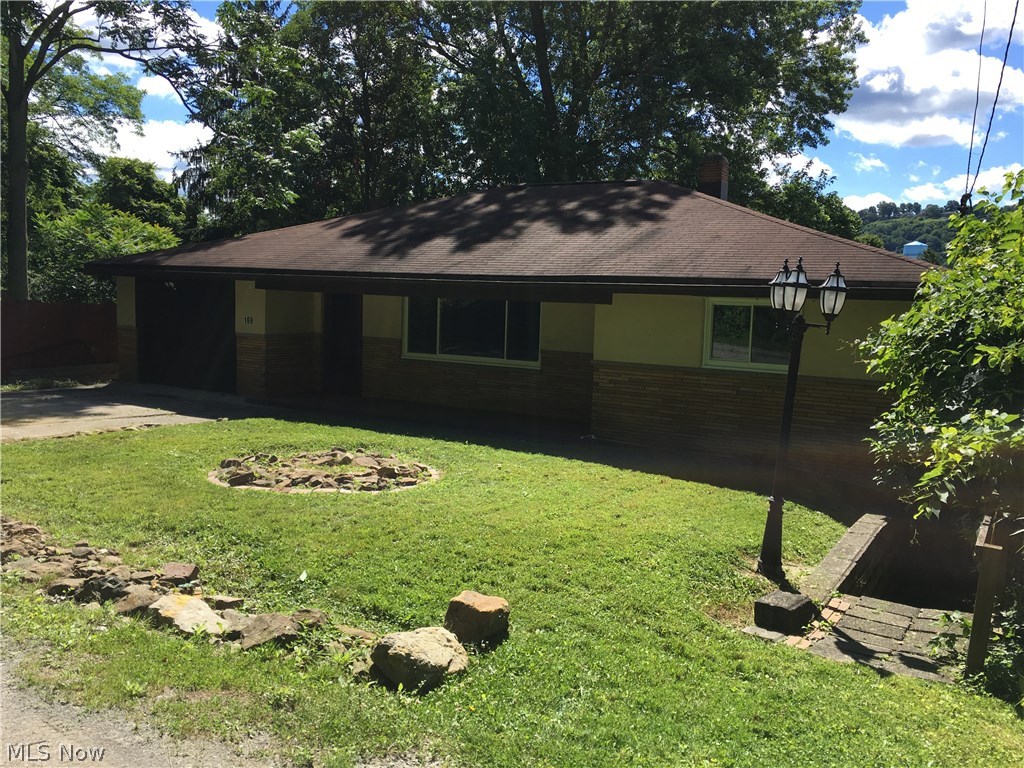 Three bedroom, 1 1/2 bathrooms, ranch home, newly remodeled, one car attached garage, granite kitchen countertops, huge finished recreation room with bar.  private setting.  Agent owned