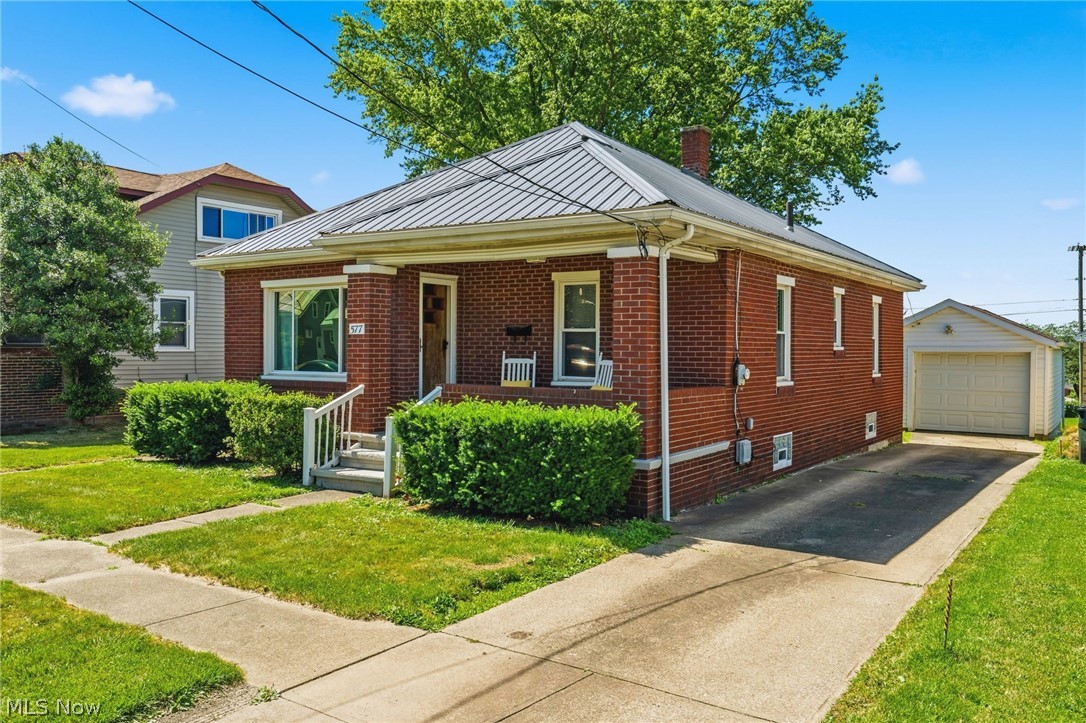 Welcome home to this charming 2-bedroom, 1-bath brick ranch located right in the heart of Carrollton! Enjoy the convenience of a fantastic location close to everything while still having a beautiful backyard that offers the perfect setting for relaxing, entertaining, and hosting gatherings with family and friends. This move-in ready home features a newer metal roof, updated glass block windows, and new vinyl flooring in the kitchen, giving peace of mind and modern touches throughout. The detached 20x14 garage provides additional storage and functionality. Whether you're looking for your first home, downsizing, or adding to your investment portfolio, this turn-key property is ready for its new owners!