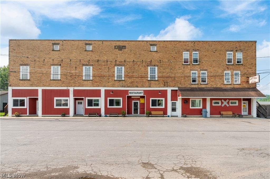 Exceptional opportunity to own a profitable, fully remodeled restaurant and bar with multiple income streams in a high-visibility location rich in local history. This well-established business has earned a strong reputation for its outstanding food, inviting atmosphere, and loyal customer base, making it an ideal investment for an owner-operator or investor.
The sale includes the fully operational restaurant and bar, along with all kitchen equipment, bar equipment, furnishings, fixtures, and a valuable D6 liquor license with Sunday sales privileges. Everything is in place for a seamless transition and continued success.
In addition to the restaurant, the property features four fully leased apartments that generate consistent monthly rental income, providing built-in cash flow. Two spacious garages offer valuable storage space or the potential for additional rental income.
Guests love the charming outdoor patio, where they can relax and dine while enjoying the unique experience of watching trains pass through this historic setting. The property has been extensively remodeled with numerous updates, making it truly move-in ready and minimizing future capital expenditures.
To help ensure continued success, the current owners are willing to remain after closing for a mutually agreed-upon transition period.
Whether you're looking to expand your hospitality portfolio, invest in a mixed-use income-producing property, or fulfill your dream of owning a successful restaurant, this rare offering combines a thriving business, stable rental income, and historic charm in one exceptional package.
Contact your favorite REALTOR today to schedule a private showing and explore everything this one-of-a-kind investment has to offer.