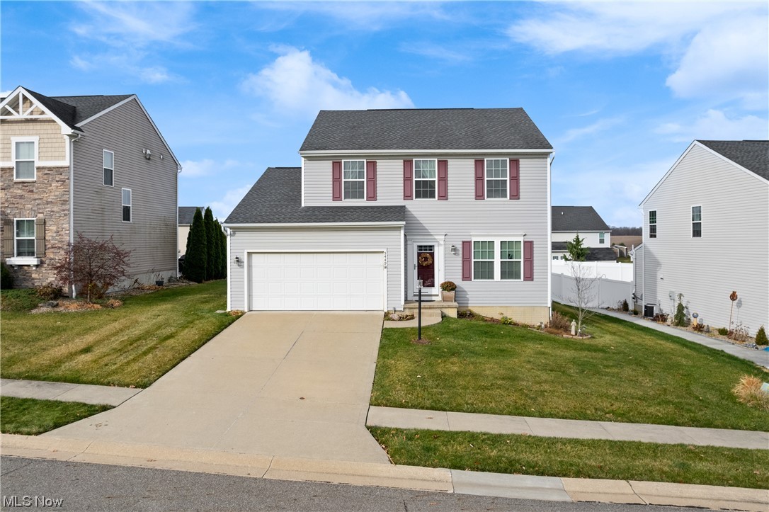 Welcome to this charming one-owner home located in Jackson Township! 
This 2-story residence offers a comfortable and spacious layout. 

The first floor features new flooring throughout. As you enter, you'll find a formal dining room, perfect for hosting family gatherings or special occasions. 
The living room is a cozy retreat, complete with a fireplace that adds warmth and ambiance during the cooler months. You will find all you need in this charming kitchen complete with a walk-in pantry provides ample storage space. The first-floor laundry adds convenience to your daily routine.

The second floor boasts a loft area, which can be used as a home office, playroom, or additional living space. The extra bedrooms are well-sized and offer comfort and privacy as well as a full size bathroom. The large master bedroom includes an ensuite bathroom and a walk-in closet.

The finished basement provides extra room for entertainment or relaxation, allowing you to create a space that suits your needs and lifestyle.

Step outside and you'll find a large stamped patio, perfect for outdoor entertaining or simply enjoying a peaceful evening outdoors.

Located in Jackson Township, this home offers easy access to local amenities, schools, and shopping centers.

Don't miss the opportunity to make this home your own. Contact an agent today to schedule a private showing and see all that this wonderful property has to offer.