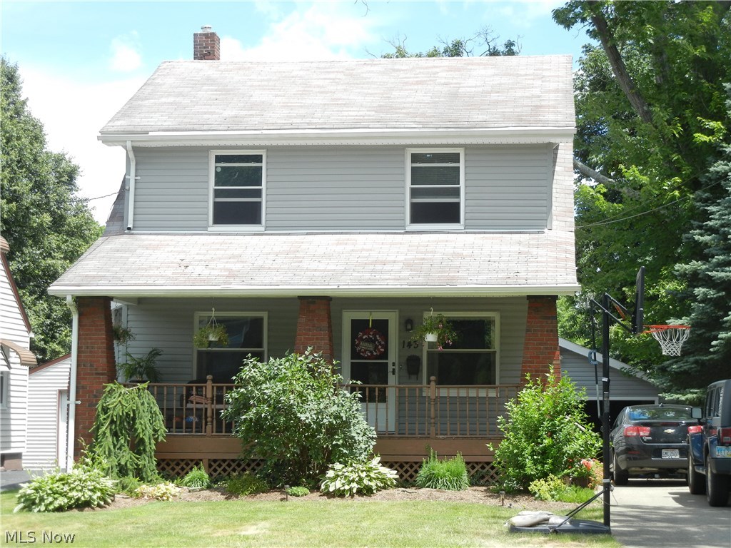 This well maintained 3 bedroom, 2 bath home features a beautiful updated oak kitchen, with ceramic tile floor and appliances that stay, Large living room and dining room w/ beautiful hardwood floors, first floor laundry (newer washer and dryer stay), first floor bedroom (currently used as a family room) has private entrance and easy access to 1st floor bathroom, could also be used as a mother-in-law suite.  Second floor includes access to the sizable walk-up attic, 2 spacious bedrooms and full bath.  Enjoy outdoor entertaining this summer on the back deck, in the private fenced-in backyard or on charming front porch! Attached 2 car garage w/ newer door.  Additional updates include C/A, siding, windows and entry doors.  Call today!