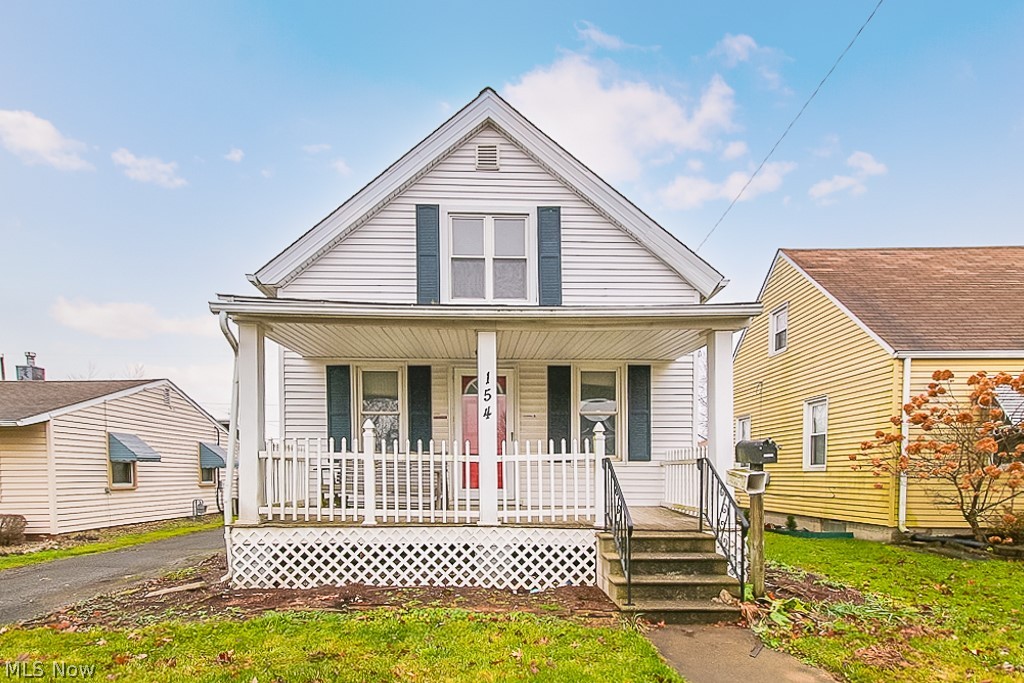 This vacant single family is a great opportunity for a first time buyer or an investor looking to build their rental portfolio! The spacious home has a large covered front porch that leads into an open, bright living area with soft gray carpeting and lined with windows! The main floor also offers a large kitchen with lots of storage space, including a walk-in pantry area, and stove and fridge, as well as a dining area and a full bath! Upstairs you'll find 2 spacious bedrooms. There is also a full basement with washer and dryer, large backyard with stone patio and detached 2 car garage. Located close to downtown Elyria, to home is near shopping, restaurants, medical centers, highways, parks and more! Don't miss out on a solid property - schedule a showing today!