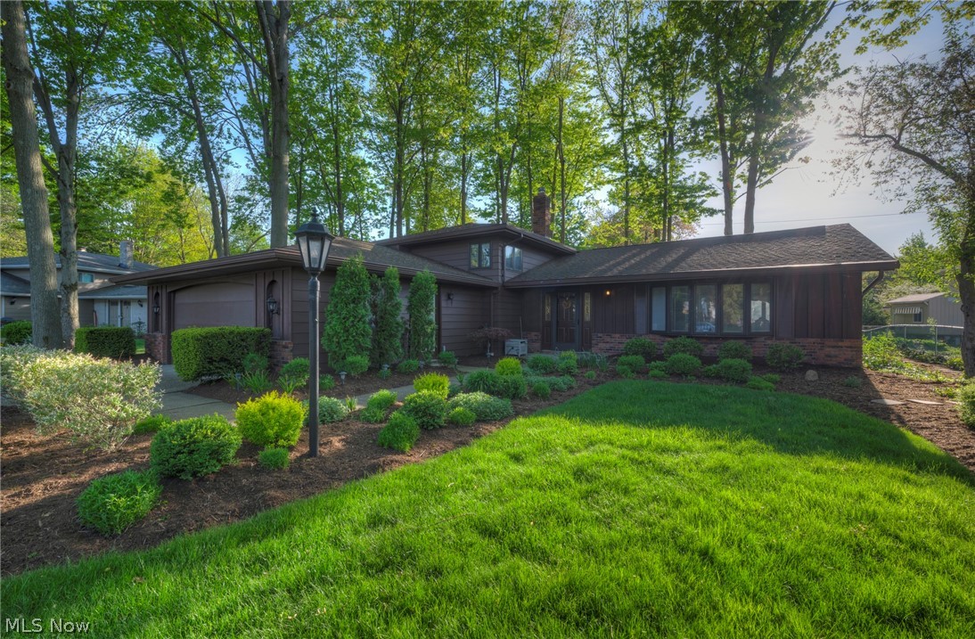 “OUTSTANDING” 4 Bedroom 2 ½ Bath Split Level in North Olmsted.  4718 Mary Kay Circle has been meticulously maintained by its original owner of the past 48 years.  This Split is situated deep into the coveted Laurel Woods development on a beautiful cul-de-sac lot. Pull up and you will immediately notice an impeccably landscaped / treed lot spanning from the front yard to the backyard. Walk in to a large Foyer showcasing a spiral staircase to the second level.  A Formal Living Room and Adjoining Formal Dining Room both have immense windows that showcase beautiful yard views.  An Eat-In Kitchen complete with all appliances, rich flooring, plenty of cabinet / countertop space will make the chef in the family happy.  The XXL Slider in the Kitchen opens to the back patio and scenic backyard which will make the kids & pets happy and outdoor get togethers special.  The lower level Family Room is complete with a fireplace to make those winters cozy and large windows for ample light.  Work out o