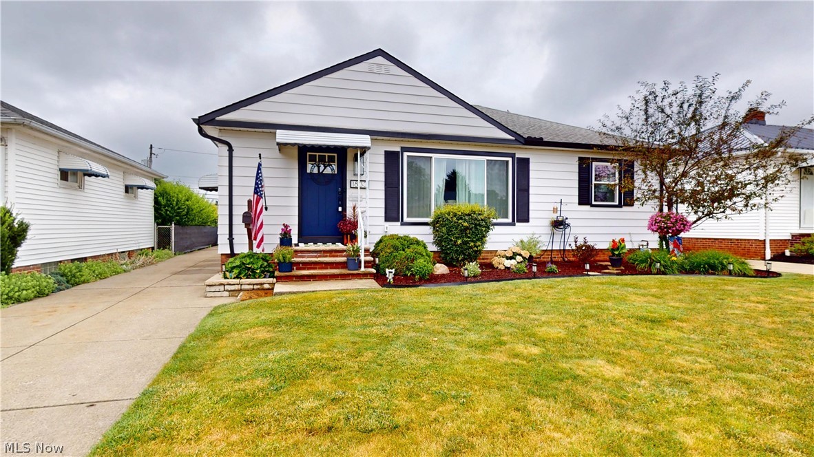 Welcome to this stunning 3-bedroom RANCH! This home has amazing curb appeal! This one- floor living home offers hardwood floors throughout. Enjoy relaxing in your spacious living room, with all the natural light streaming through your brand-new windows (2026). The kitchen has a new refrigerator and built-in microwave, equipped with a gas stove to inspire the chef in you! Plenty of closet space is offered in all three spacious bedrooms. The bathroom vanity and toilet were also replaced in 2026. The FULL basement is partially finished with brand new carpet and paint, perfect for a second living space! The utility room has Nature Stone throughout and tons of storage space! Hot water tank (2023). It gets better... Enjoy your summer nights, relaxing around the fire pit in this beautiful park-like backyard! More recent upgrades include the new garage opener, new doors, and Ecobee thermostat.  This home is waiting for its next owner, make your appointment before its too late!