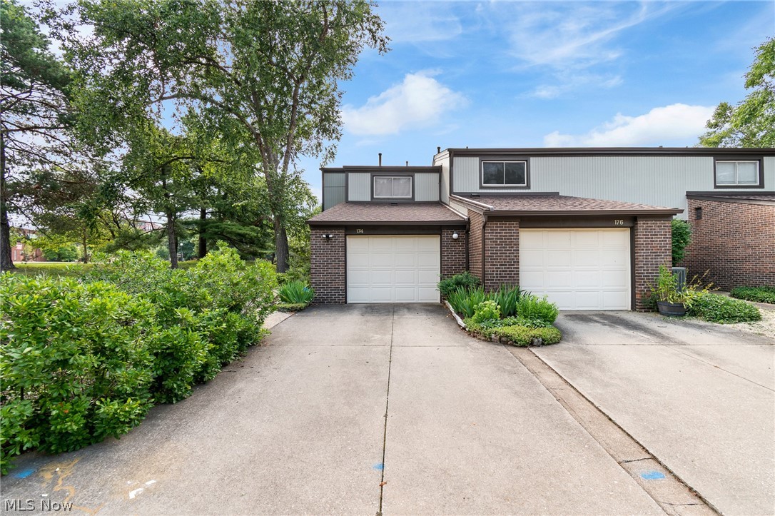 NOW...Look at This!!! Beautifully maintained end-unit condo in the desirable Canal Park community! This move-in-ready home offers 2 bedrooms, 1 full bath, and 1 half bath in an ideal location along the historic canal. Enjoy stunning gardens and professionally maintained landscaping that wrap from the front of the home to the private, fenced courtyard and deck in the back—perfect for relaxing or entertaining. Step right out your back gate to access the scenic canal walking path and enjoy nature just outside your door. Inside, you'll find a spacious, well-cared-for interior featuring a cedar closet, a full basement for abundant storage or future finishing potential, 100-amp electrical service, and all appliances included. The deck and privacy fence were freshly stained in 2025, adding to the home's exceptional curb appeal and low-maintenance lifestyle. Rare opportunity to own a beautiful end-unit condo with private outdoor living in one of Akron's most charming canal-side communities!