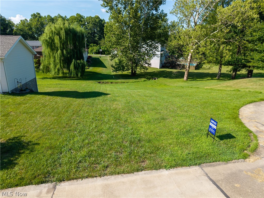 Build your new home on this 0.23± acre lot located at the end of a quiet cul-de-sac in the desirable Wildwood Subdivision. Enjoy the privacy of a low-traffic setting while remaining just minutes from shopping, dining, schools, and other Parkersburg amenities. An excellent opportunity to build in an established neighborhood with public utilities available at the street (buyer to verify). To find the property, turn left onto E Wildwood Dr. Map available in the photos.