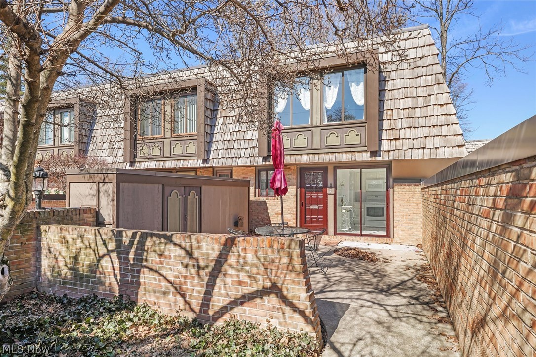Welcome to 1110 By-The-Shores Drive #4 in Huron, a beautifully updated 2-bedroom, 1.5-bath condo offering comfort, convenience, and coveted access to Lake Erie. With an HOA of $399 per month and no assessments, the fee includes natural gas for furnace and hot water, water and sewer, trash removal, lawn care, snow removal, and exterior maintenance, making for truly low-maintenance living near the water. The first floor has been remodeled, including the entryway, guest bath, kitchen, and living room. The charming kitchen features light colored cabinetry and newer bright white appliances including dishwasher, refrigerator, stove, microwave, and garbage disposal. The sliding glass doors in the kitchen open up to a front patio area. A spacious living room with a three-paneled sliding glass door fills the home with natural light and opens to a private back patio, perfect for relaxing or entertaining. The living area offers a generous footprint, comfortably accommodating both a full living room setup and a dedicated dining space, creating a seamless and versatile environment for everyday living and entertaining. Upstairs, both bedrooms are generously sized with plush carpeting and ample closet space. The shared and remodeled Jack and Jill bath is clean and well maintained, and the conveniently located hallway laundry area includes newer washer and dryer. Additional updates include new roof (2023), new hot water tank, new carpeting, LED lighting throughout, ductwork and waste plumbing cleaned in 2023, and a home warranty through September 2026. A garage space completes this move-in-ready home just moments from the shoreline.