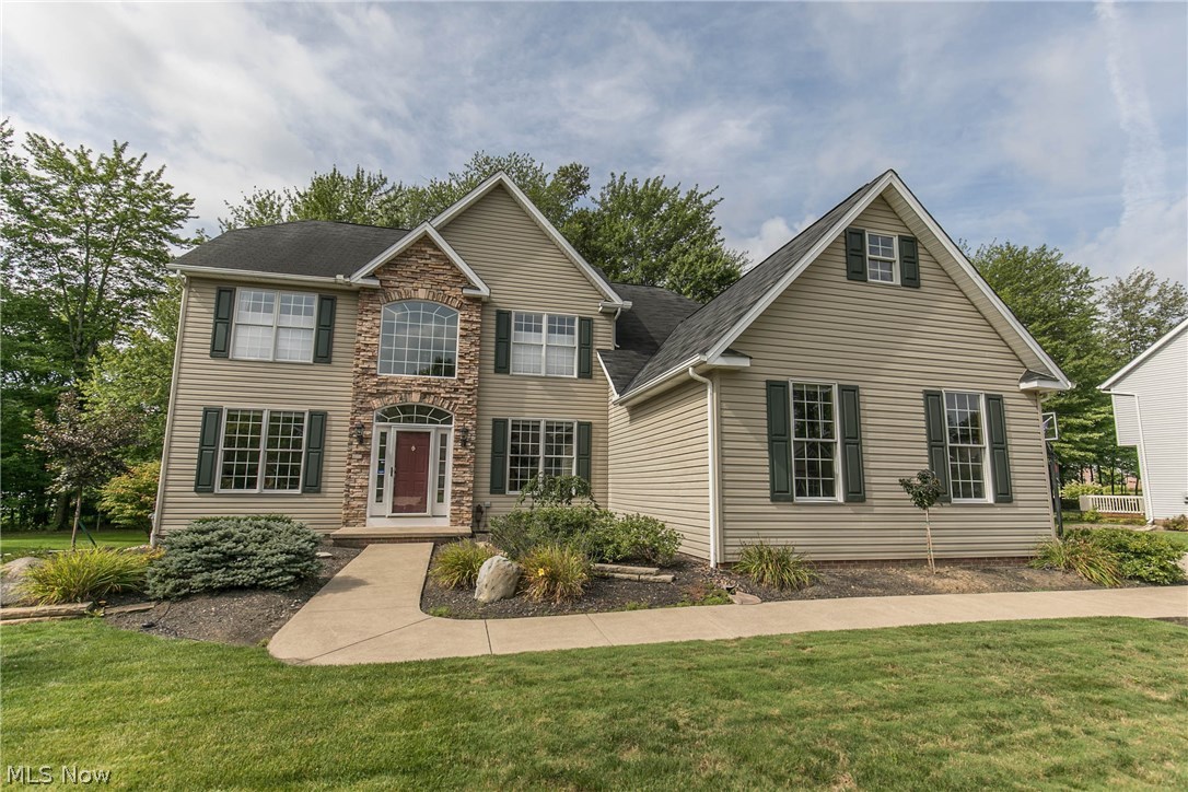 Stunning Colonial! You Are Greeted By Two Story Foyer, Formal Living Room, Formal Dining Room, Family Room With Two Stories and Fireplace. First Floor Den and Laundry. Kitchen Open To Family Room Boasts Maple Cabinets, Granite Counter Tops and Ceramic Tile Flooring. Second Floor With Master With Vaulted Ceiling, Double Sinks, Soaker Tub, Separate Shower and Private Commode. 3 Additional Bedrooms All With Ceiling Fans, Ample Closet Space and Carpeting. Finished Lower Level With Full Bath, Exercise Area, Recreation, Bar Area and Storage. Side Entry 3 Car Garage With Built-In Shelving, Hot and Cold Water and Heater (Not Hooked Up, But Will Stay). Private Lot With Custom Storage Shed, Fire Pit Area and Professionally Landscaped. Large Deck and Grill Area. All Appliances To Stay Including Washer and Dryer. Additional Features Include: Security System, Sprinkler System, Extensive Exterior Lighting, Hot Water Heater 6 Years, Kitchen Remodel 2011, Super Energy Efficient Extra Insulation. Roof,