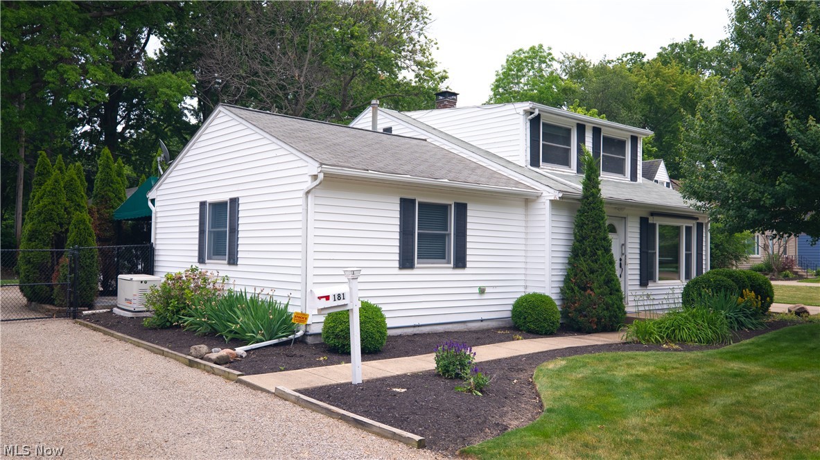 Welcome to this beautifully maintained 4 -bedroom, 2.5 bath Cape Cod located less than 2 blocks from Lake Erie with private lake access. Enjoy the convenience of nearby Sunset Park, featuring playgrounds, walking trails, and green space. The home features a first-floor primary suite with an updated bathroom and stunning walk-in tile shower, an updated kitchen, and multiple spaces to relax and entertain, including a 3-Season Room and awning covered back patio. Outside, you will find a private backyard with mature landscaping, a paver garden path, storage shed, and a historic tree likely dated to the George Washington Era. Additional highlights include a detached heated garage with 220-volt service, an additional 220-volt service at the covered patio for future amenities (hot tub), and a whole-house Generac Natural Gas Generator for added piece of mind. This is rare opportunity to enjoy private lake access, modern conveniences, and the charm of one of Avon Lake's oldest and most historic lakefront neighborhoods.