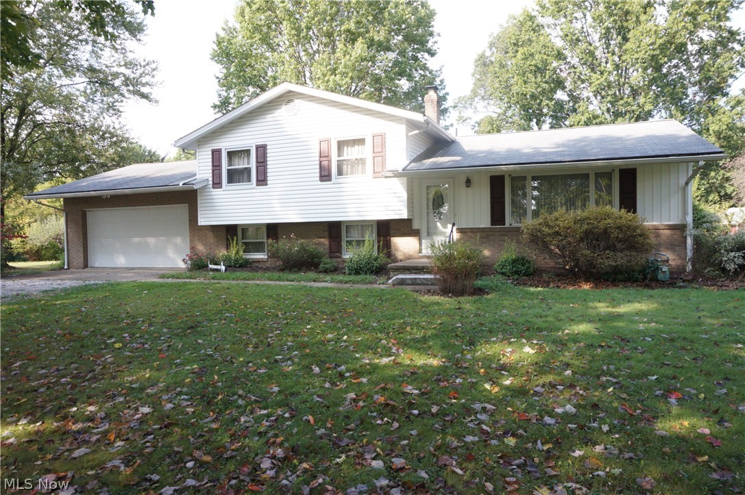 Welcome Home to 11195 Lloyd St! This lovingly cared for home features FOUR bedrooms, PLUS an office that can easily be a possible 5TH Bedroom. There are 2 full baths, one on upper level, one on lower level. Family room on lower level and  full basement with built in  storage and laundry. Admire the hardwood floors in this wonderfully well kept one owner home. large enclosed patio off the dining area overlooking the private backyard and in ground pool. In ground  pool area is fenced in with a gate, barn also for equipment. Great for entertaining or having a quiet cup of coffee in a serene country like setting. So many flowering bushes and trees to enjoy! Fruit trees, berry bushes, a grape arbor and a huge garden area for your hobby farm! 4 parcels! So many possibilities.
There is a 2 car attached garage plus an additional 2 car detached garage with a covered carport.  Great home in a great location!