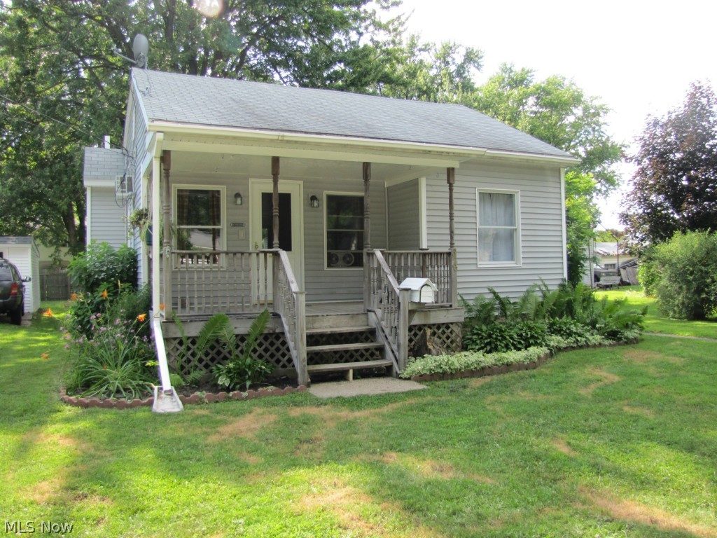 This beautifully updated, move-in ready, 2 bedroom ranch would make a great first home or would be equally great for someone looking to downsize.  With new carpet, laminate wood flooring, kitchen cabinets, hot water tank, gutters, and fresh paint, there is plenty of time to enjoy the back yard with garden and flower beds.  It is centrally located to all of Geneva's recreation, business and schools; and after a long day of being on the go, come home to relax in this quiet neighborhood on your covered front porch or entertain on the large back deck!