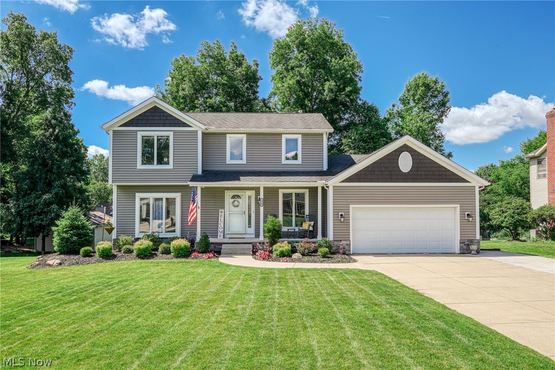 Welcome to 1560 Applewood Way in Green Local School District. This well-maintained 3-bedroom, 2.5-bath colonial offers comfortable living spaces, thoughtful updates, and a location convenient to schools, parks, shopping, dining, and major commuter routes.

The main level offers a spacious family room, a large eat-in kitchen with extensive counter space, and a flex-room that can serve as a home office or additional living area. Two sliding glass doors provide access to the expansive deck, creating a great space for entertaining or relaxing outdoors.

Upstairs, you'll find three bedrooms, including a spacious primary suite with a private bath featuring an oversized shower and generous closet space. Two additional bedrooms and a full bath complete the second floor.

The partially finished basement provides additional living space that can be used as a recreation room, exercise area, hobby space, or media room while still offering plenty of storage. The laundry and workshop area adds even more flexibility, and the walkout basement provides convenient access to the backyard.

Recent improvements include a remodeled first-floor half bath, updates to the primary bathroom, updated lighting, landscaping improvements, carbon water filtration system (2022), dishwasher (2023), washer (2024), and microwave (2025).

If you've been looking for a home that offers space, flexibility, and a convenient Green location, 1560 Applewood Way is one you'll want to see.