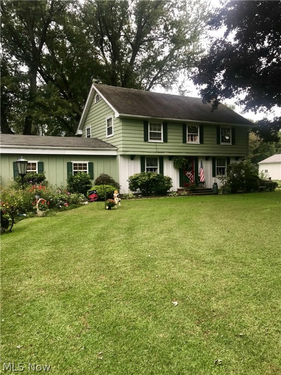 Looking for a mini farm minutes from I-90, shopping, Lake Erie? This 4 bedroom Colonial has so much to offer. Featuring a Large family room, formal living room with stone fireplace, beautiful hardwood flooring & wormy chestnut wood gives much detail to the living room, oak wood staircase, most of the doors are solid cherry. First floor half bath & laundry. Basement area features a partially finished room with bar area for entertaining & plenty of room for storage Pasture with Barn also there is a large attached pole barn to accommodate ATV's, lawn equipment, cars & more! Put this one at the top of your list you!