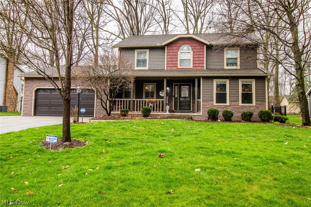 Welcome to this highly sought-after home nestled in the desirable neighborhood of Hickory Trail in Stow! Boasting 3 bedrooms, 2.5 baths, and a finished basement with an additional bonus room. Impeccably updated throughout, this home features a plethora of upgrades including new siding, AC, furnace, unlimited hot water with the brand-new tankless water heater, stamped concrete patio, landscaping, bump out in driveway, fenced in backyard, and more. Step through the inviting covered porch into a spacious foyer, leading to a versatile office or additional living area, adorned with new blinds throughout the entire house. The heart of the home is the stunning eat-in kitchen, seamlessly connected to the cozy living room adorned with a gas fireplace with an exquisite mantle. Enjoy the convenience of a main-floor laundry and a half bath leading to the attached 2.5 car garage with new built-in storage. Outside, revel in the stamped concrete patio with a fire pit, perfect for entertaining, complemented by a oversized deck. Upstairs, discover two generously sized bedrooms, a full bath, and a luxurious master suite with a bonus room and walk-in closet. The master bath boasts modern amenities including a spacious shower, double vanity and Bluetooth speakers! Downstairs, the finished basement offers a versatile recreation room, an additional bonus room with new flooring and utility room with sink, ideal for a home gym, and ample storage space. Don't miss the chance to make this dream home yours—schedule your showing today!