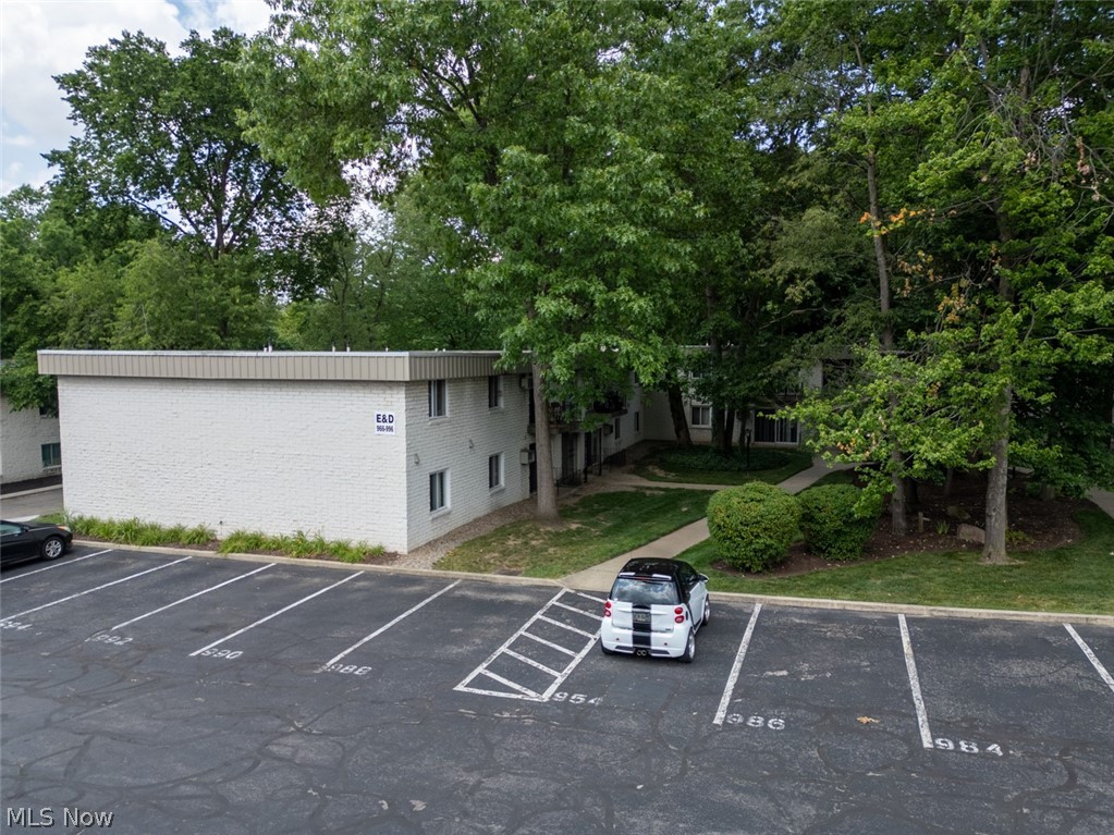 Welcome to Oak Haven Condominiums, your sanctuary on S. Lincoln St!  Nestled in the ideal location close to Kent State University and beautiful downtown Kent Ohio!  Approaching unit 996 you'll be greeted by a lovely and quiet courtyard with mature trees.  Upon entering the unit located on the 2nd floor you will find a large living room and dining area with an open kitchen.  Enjoy sipping your morning coffee on the balcony!  Down the hall you will find a spacious primary bedroom featuring it's own half bath, the 2nd bedroom and main full bathroom.  Updates include luxury vinyl plank flooring in both bedrooms (2026), kitchen countertops (2026) and fresh paint throughout.  Currently leased through June 30, 2027.  Perfect for your rental portfolio, student or anyone looking for quiet and maintenance free living in the heart of Kent!